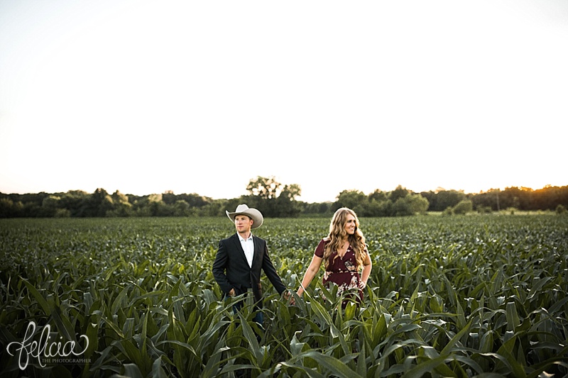 images by feliciathephotographer.com | symmetry | engagement photographer | kansas farm | country | golden hour | sunset | romantic | true love | southern belle | bride to be | corn field | cowboy hat | floral dress