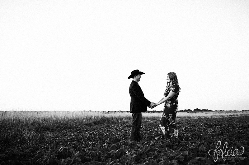 images by feliciathephotographer.com | engagement photographer | kansas farm | country | golden hour | sunset | romantic | true love | southern belle | bride to be | wheat field | cowboy hat | floral dress | black and white 