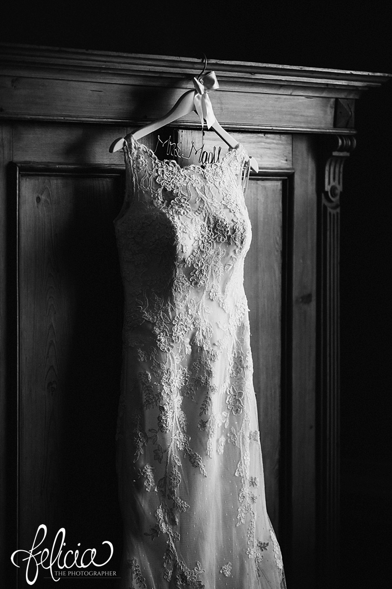 images by feliciathephotographer.com | mildale farm | destination wedding photographer | kansas | country | details | black and white | justin alexander | gown gallery | bridal | hanger | wire | 