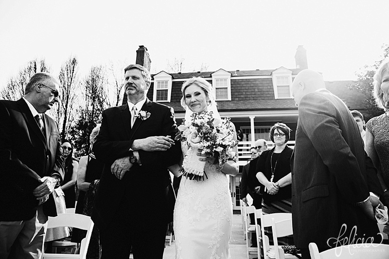 images by feliciathephotographer.com | mildale farm | destination wedding photographer | kansas | country | black and white | walking down the aisle | father giving away daughter | ceremony | 