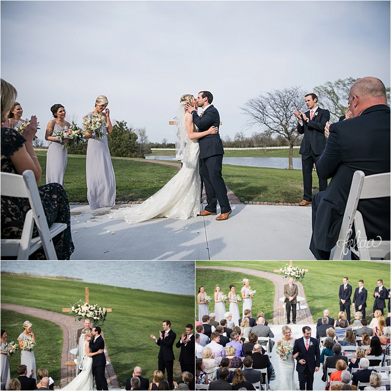 images by feliciathephotographer.com | mildale farm | destination wedding photographer | kansas | country | ceremony | mr and mrs | first kiss | romantic | cross | walking down the aisle | guests | lavender dresses | navy suits | lace | married | 