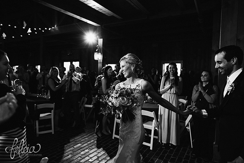images by feliciathephotographer.com | mildale farm | destination wedding photographer | kansas | country | black and white | grand entrance | holding hand | reception | celebration | lace | laugther
