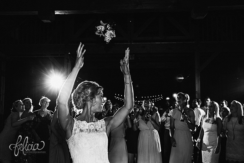 images by feliciathephotographer.com | mildale farm | destination wedding photographer | kansas | country | bouquet toss | details | black and white | single ladies | laughter | smile | reception | party | celebration |