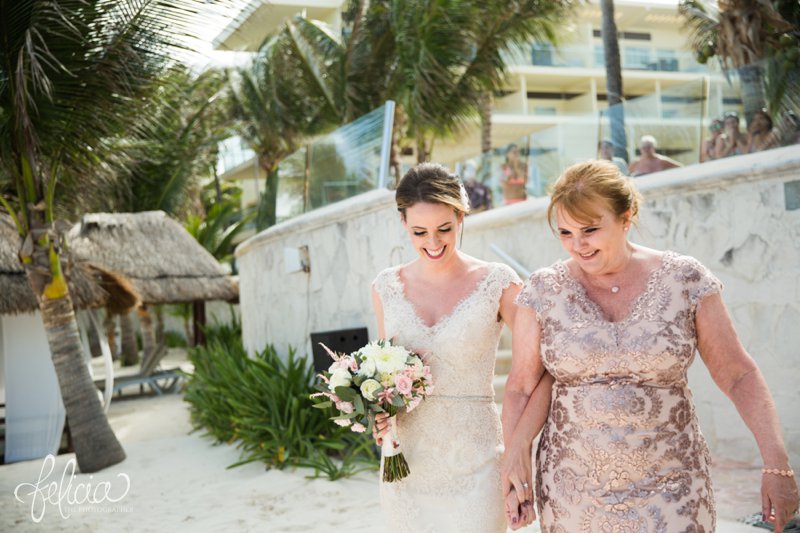 images by feliciathephotographer.com | Destination Beach Wedding | Mexico Resort | Photography | Azul Sensatori | canopy | sequins | lace dress | bouquet | mother giving away daughter | palm trees | ocean | joy | up-dos | walking down the isle 