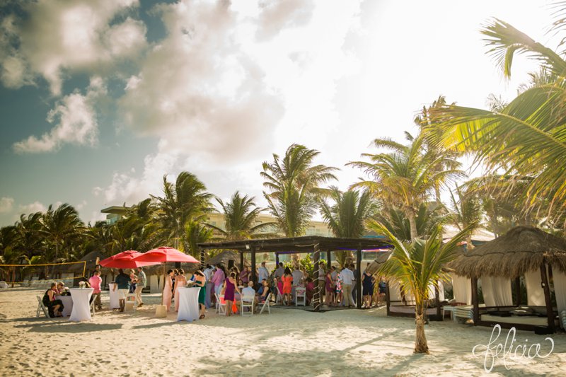 images by feliciathephotographer.com | Destination Beach Wedding | Mexico Resort | Photography | Azul Sensatori | palm trees | golden hour | blue sky | clouds | cocktail hour | drinks | friends and family | mingling | drift wood decor | gazebo | 