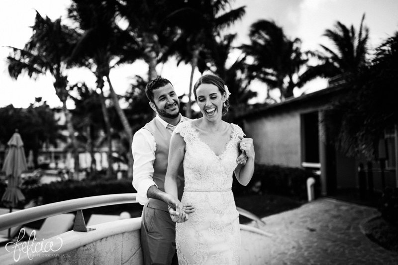 images by feliciathephotographer.com | Destination Beach Wedding | Mexico Resort | Photography | Azul Sensatori | portrait | black and white | laughter | smiling | bride | groom | sunset | palm trees | cuddling | bridge 