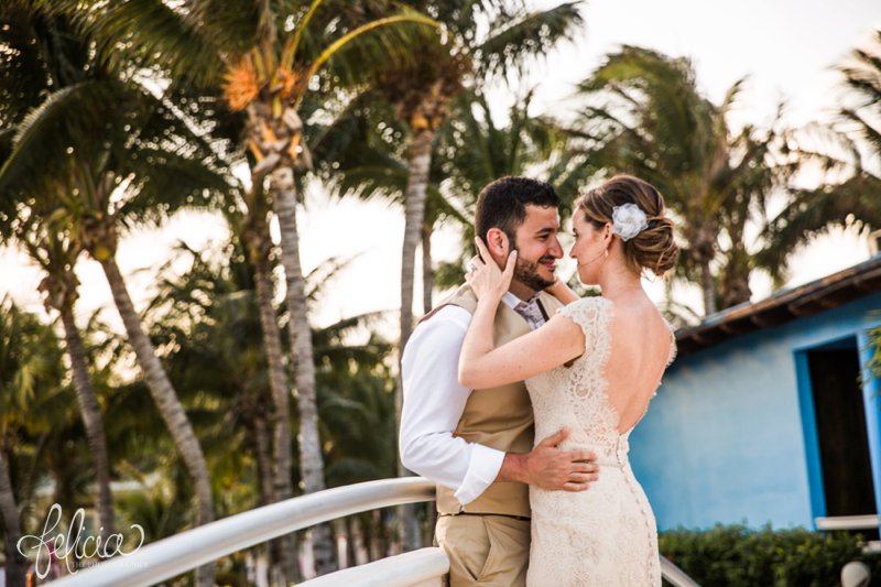 images by feliciathephotographer.com | Destination Beach Wedding | Mexico Resort | Photography | Azul Sensatori | bridge | palm trees | portrait | open back lace dress | tan suit | sweet | sentimental | true love | blue | 