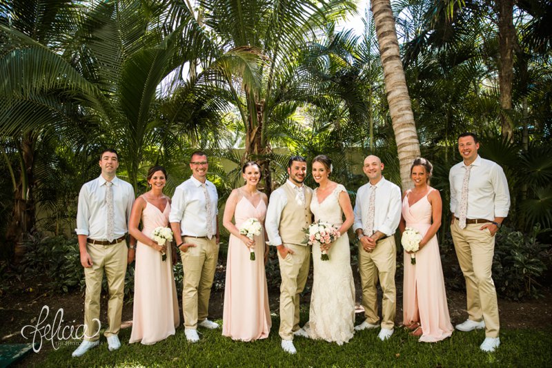 images by feliciathephotographer.com | Destination Beach Wedding | Mexico Resort | Photography | Azul Sensatori | bridal party | groomsmen | couples | palm trees | pastel pink | long dresses | lace | tan suit | white sneakers 