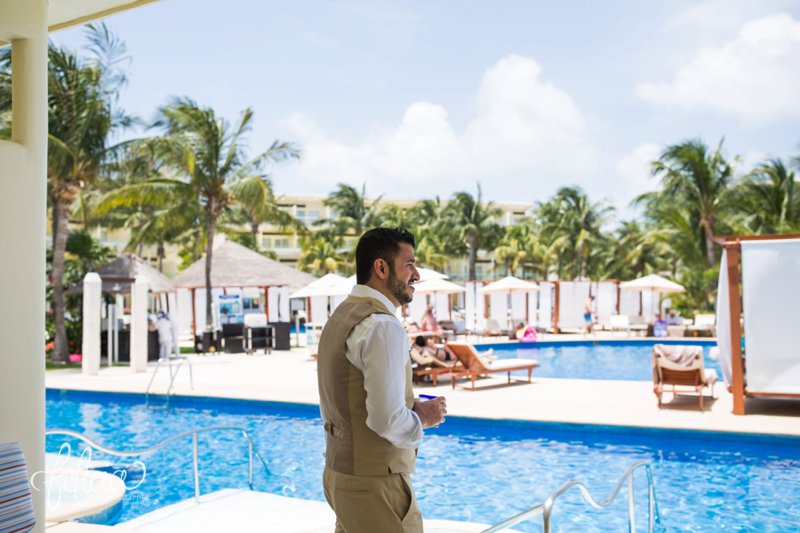 images by feliciathephotographer.com | Destination Beach Wedding | Mexico Resort | Photography | Azul Sensatori | Getting Ready | Pre-Ceremony | Pool | Palm Trees | Groom | Kakis Suit | Ocean View | 