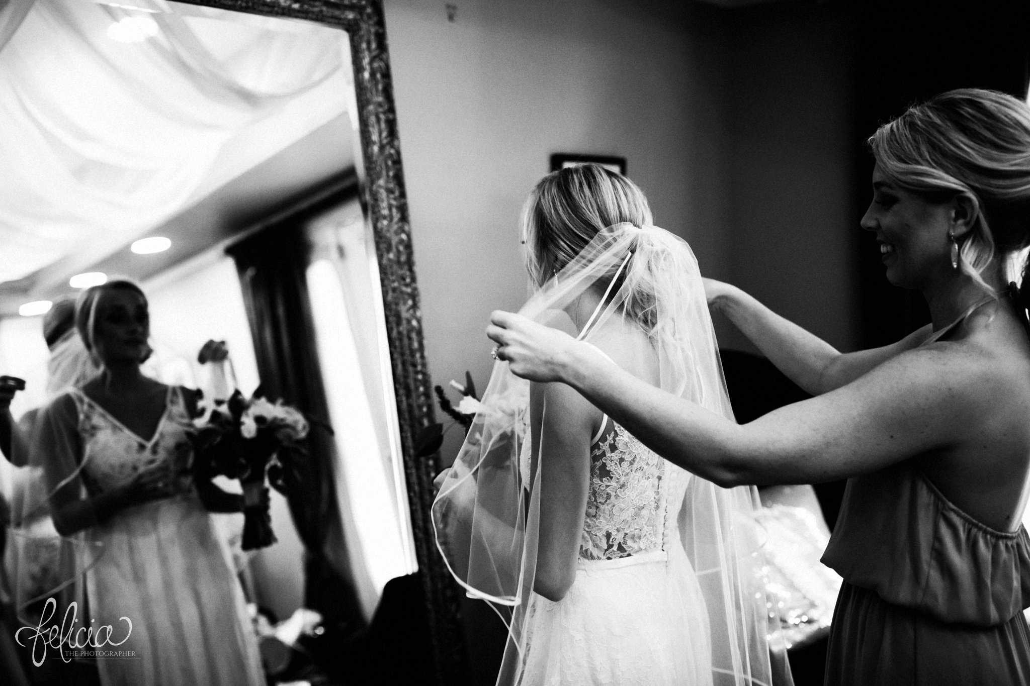 images by feliciathephotographer.com | destination wedding | the makey house | dave gibson coordinator | travel photographer | Savannah, georgia | southern | getting ready | details | veil | bridesmaid | black and white | lace dress | 