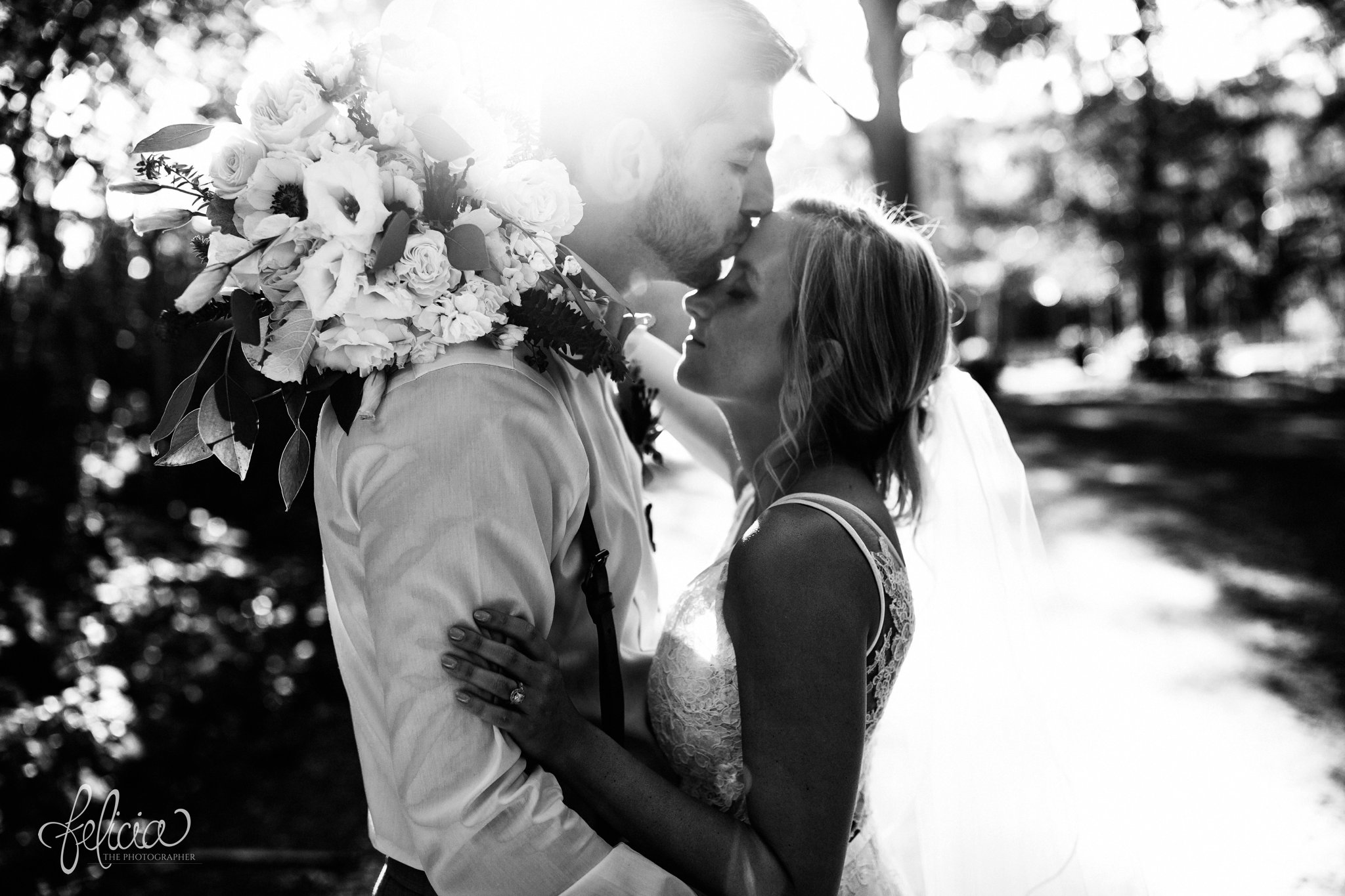 images by feliciathephotographer.com | destination wedding | the makey house | dave gibson coordinator | travel photographer | Savannah, georgia | southern | gravel road | portraits | bride | groom | golden hour | sunset | trees | green | romantic | brown suspenders | lace dress | train | cuddly | kiss | black and white 