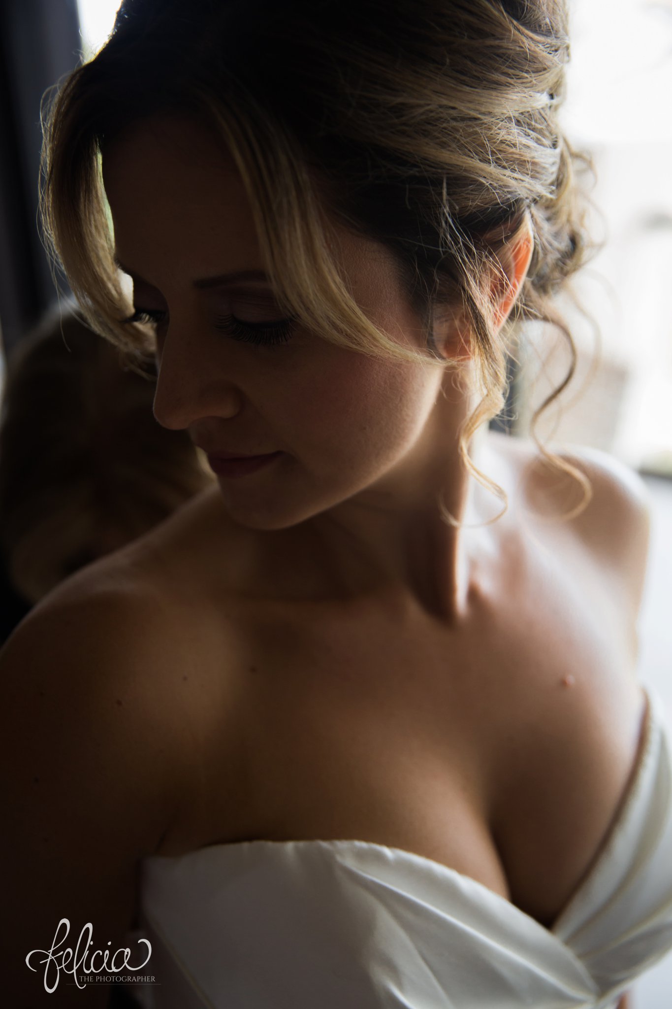 images by feliciathephotographer.com | Destination Beach Wedding | Unicco 20 87 | Photographer | L&S Travel | getting ready | bridal portrait | curly up-do | natural light | strapless dress | elegant 