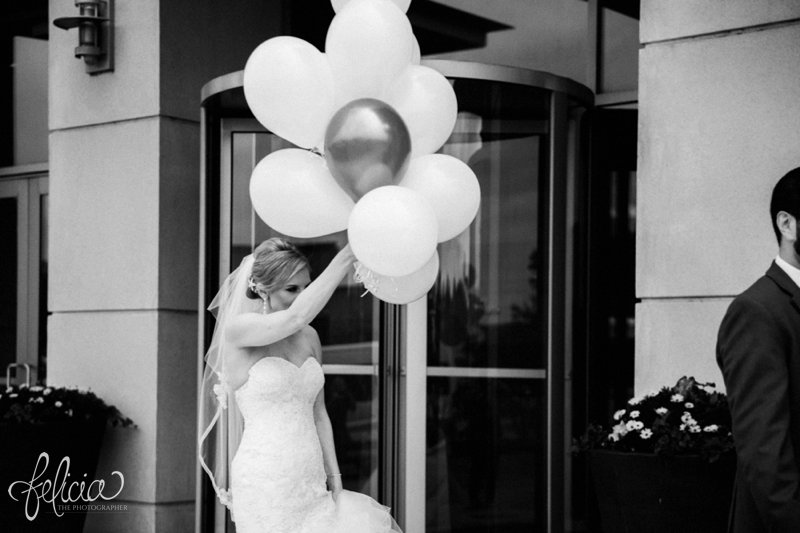 images by feliciathephotographer.com | destination wedding photographer | westin north shore | Chicago botanical gardens | first look | pre-ceremony | balloons | black and white | walking to the groom | black suit | lace dress | romantic | chic 