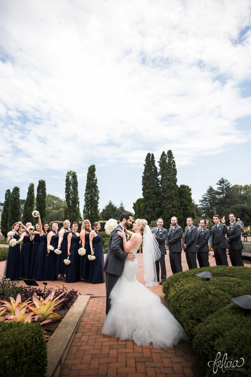 images by feliciathephotographer.com | destination wedding photographer | westin north shore | Chicago botanical gardens | portrait | bridal party | rose bouquet | greenery | celebration | navy dress | lace | tule | gray suits | 