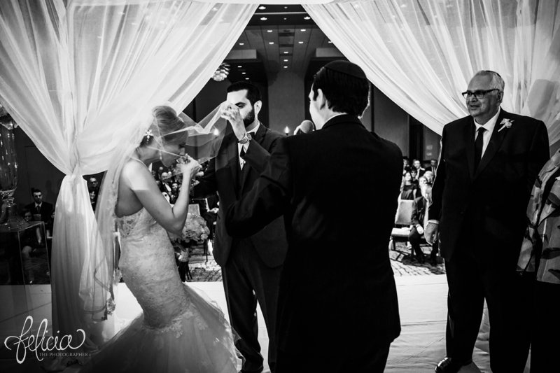images by feliciathephotographer.com | destination wedding photographer | westin north shore | Chicago botanical gardens | ceremony | lace | tule | chuppah | reddington bridal | laughter | joy | true love | rabi | vows | yamaka | sentimental moments | black and white | unveiling | drink of wine | tradition