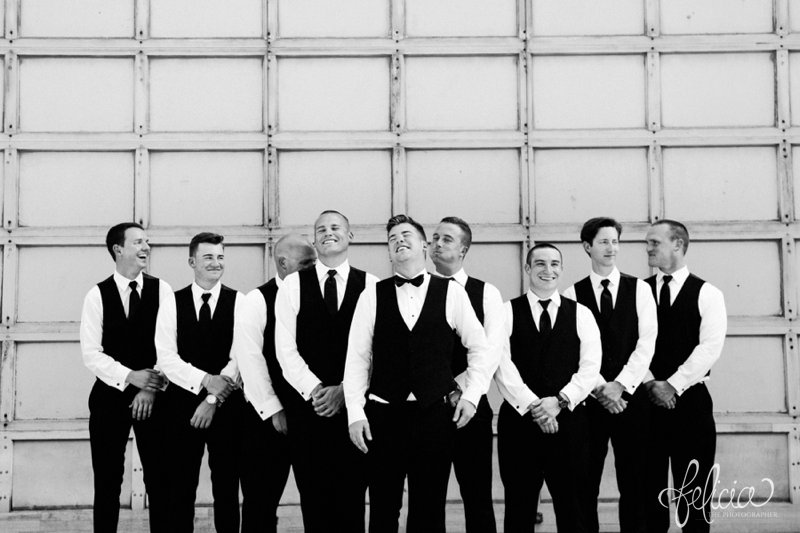 images by feliciathephotographer.com | wedding photographer | kansas city missouri | industrial | romantic | neutral | candid | laughter | joyful | groomsmen | portraits | west bottoms | silly | black and white |