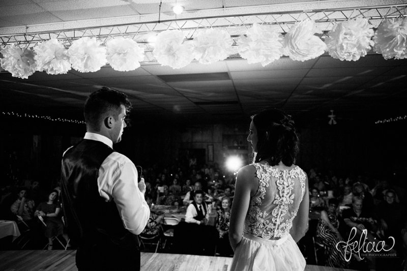 images by feliciathephotographer.com | wedding photographer | kansas city missouri | industrial | romantic | neutral | toasts | details | lace two piece dress | mia's bridal | reception | 