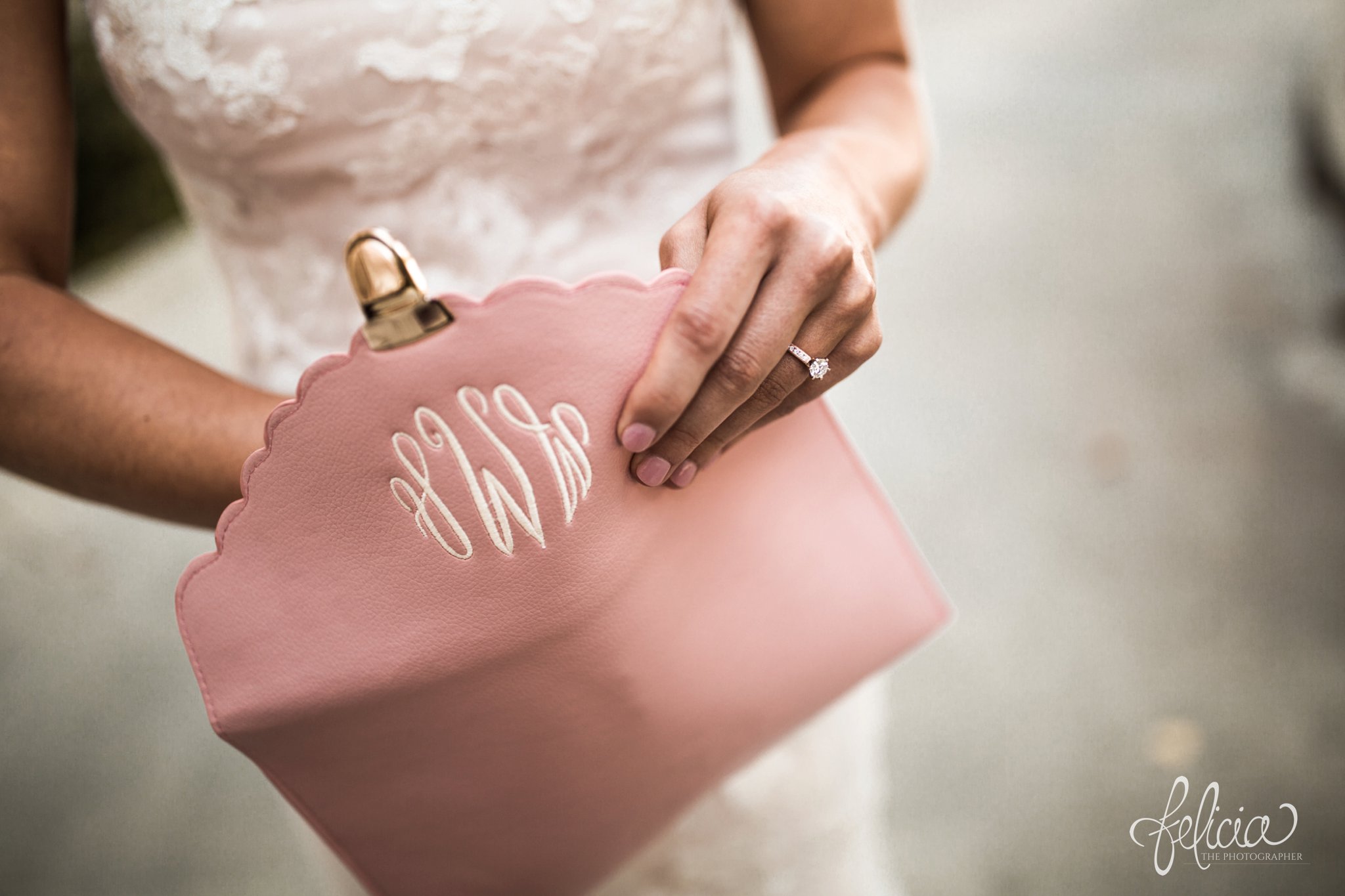 images by feliciathephotographer.com | wedding photographer | kansas city | details | pre-ceremony | diamond engagement ring | shane co | monogrammed clutch | light pink | gold | lace floral dress | emily hart | 