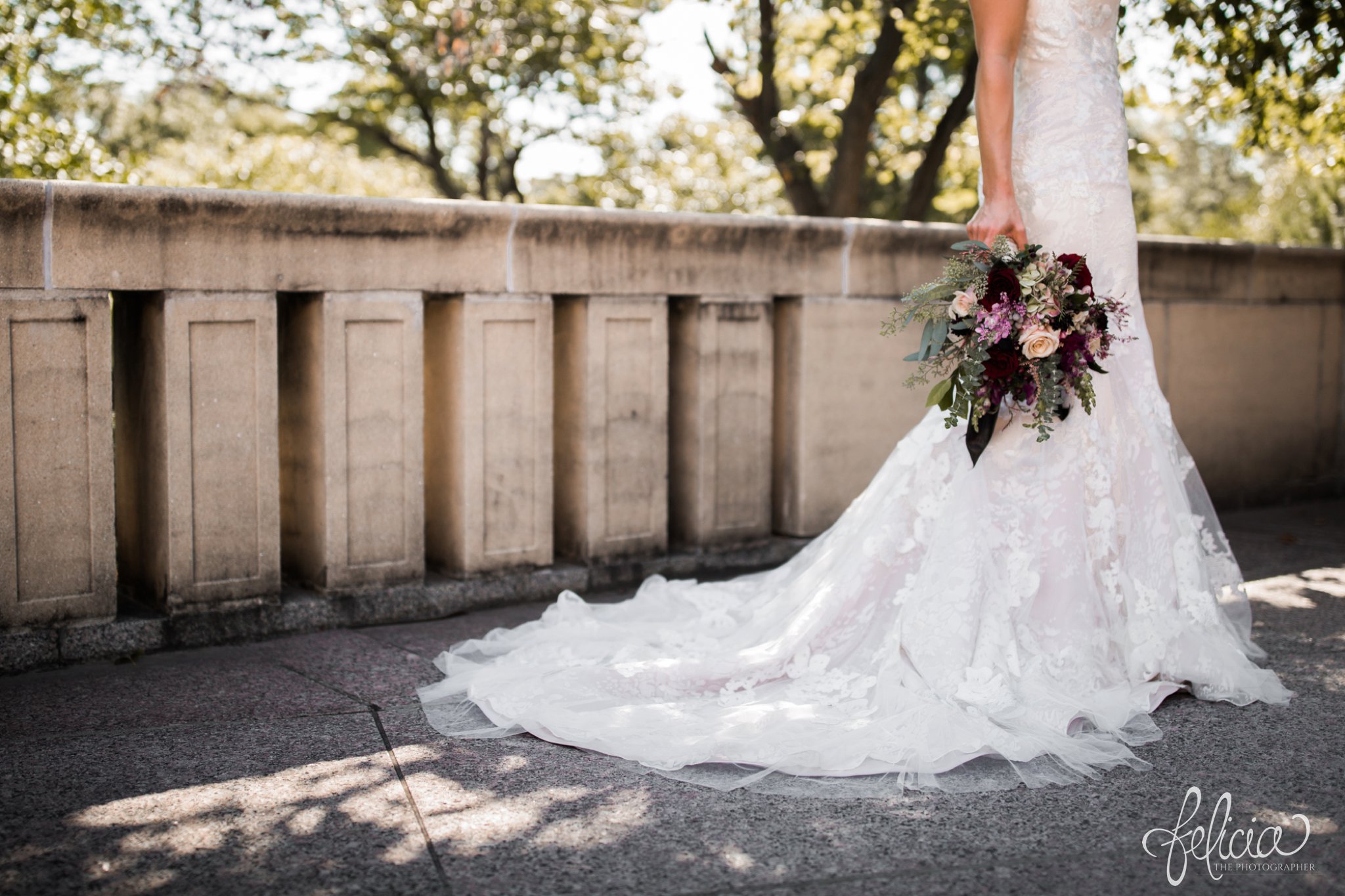 images by feliciathephotographer.com | wedding photographer | kansas city | details | long train | lace floral gown | emily hart | burgundy flowers | nelson atkins art museum | stone | 