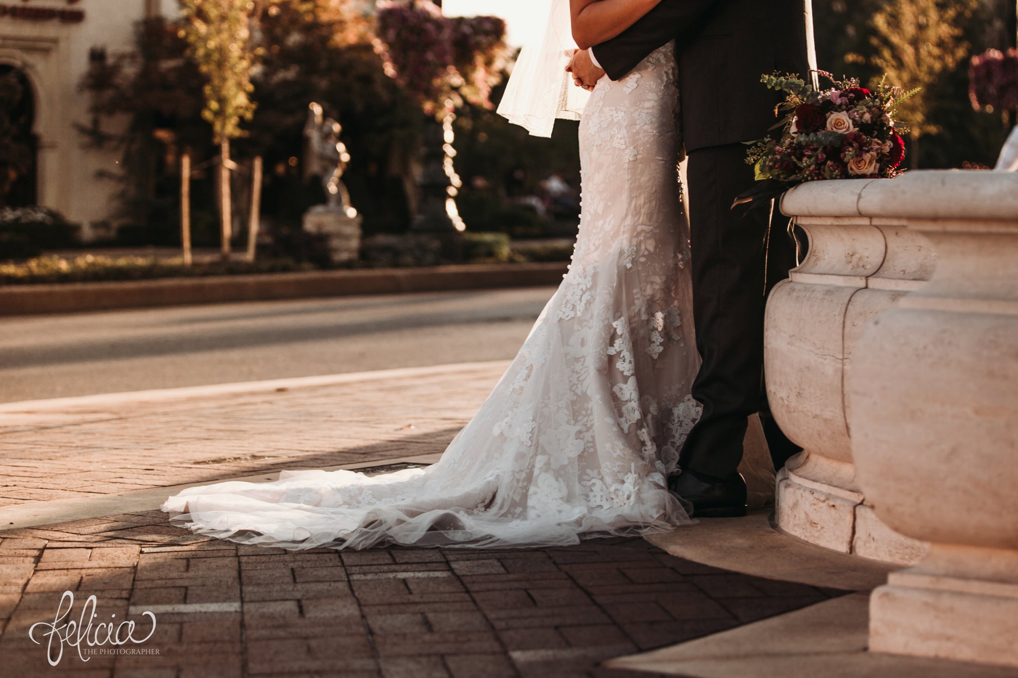 images by feliciathephotographer.com | wedding photographer | kansas city | emily hart | lace floral train | the black tux | golden hour | sunset | grey suit | romantic | plaza fountains | 