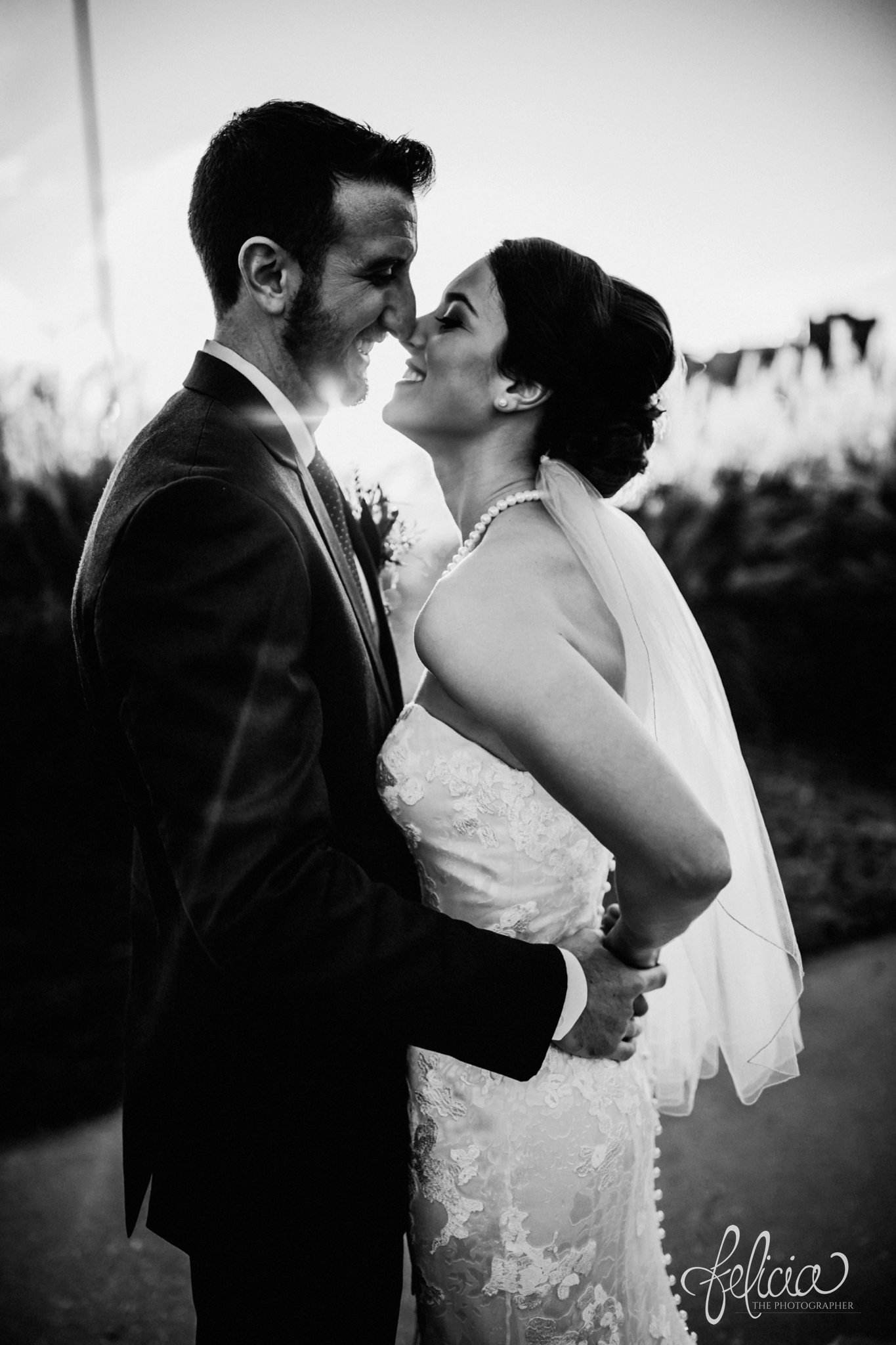 images by feliciathephotographer.com | wedding photographer | kansas city | portrait | bride and groom | pearls | kiss | joy | smokey eye | black and white |