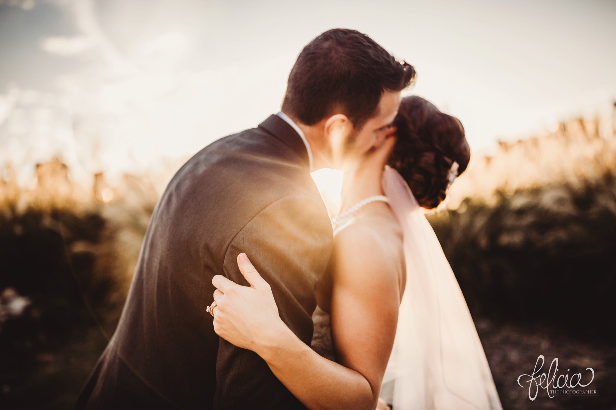 images by feliciathephotographer.com | wedding photographer | kansas city | sunset | golden hour | kiss | love | wheat | grey suit | pearls | 