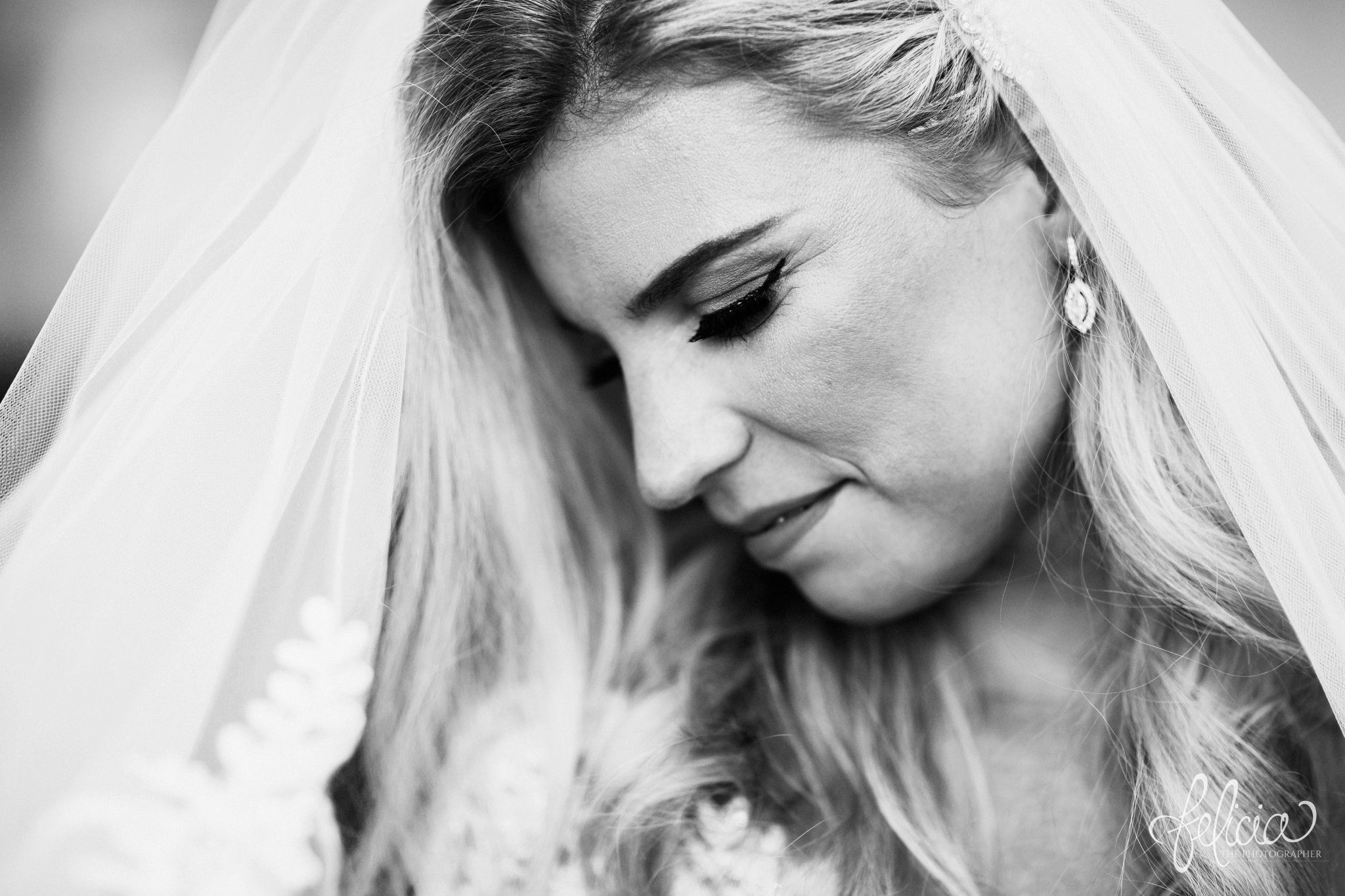 images by feliciathephotographer.com | wedding photographer | kansas city | redemptorist | classic | whimsical | romantic | paradise hair and makeup | smokey eye | lace veil | black and white | 