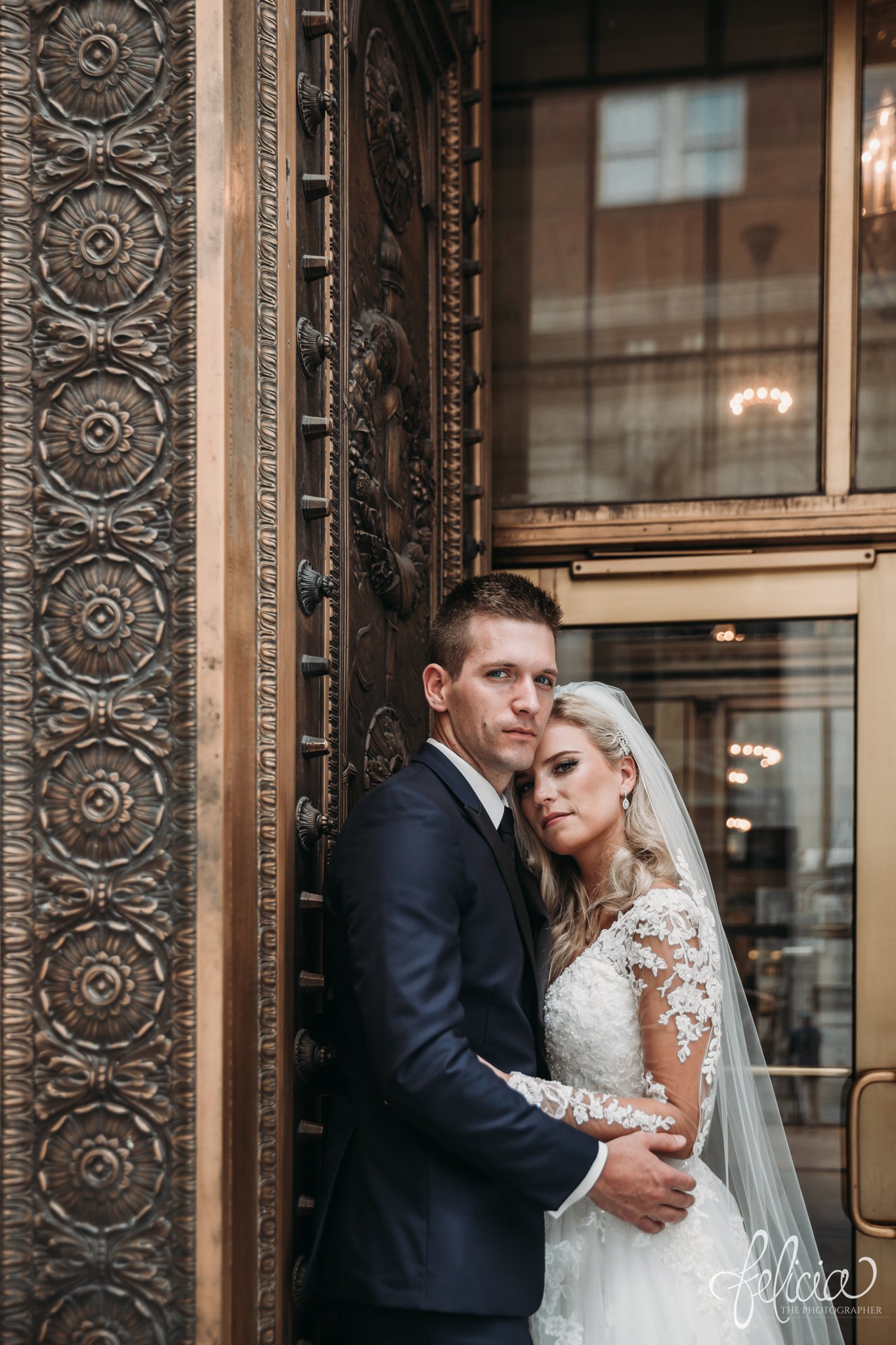 images by feliciathephotographer.com | wedding photographer | kansas city | redemptorist | classic | portrait | bride and groom | romantic | power couple | glamorous | sincere | lace long sleeve dress | navy suit | 