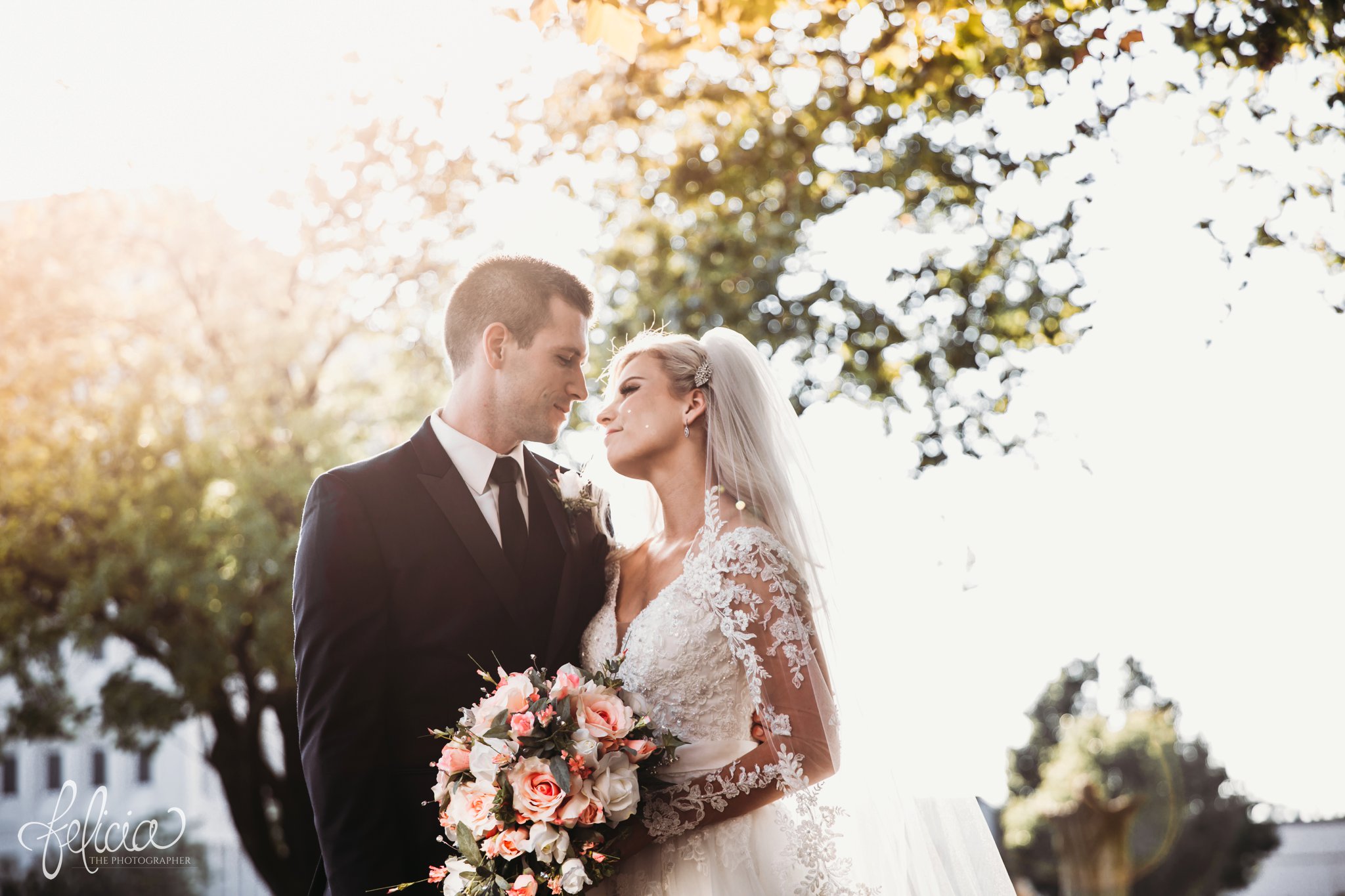 images by feliciathephotographer.com | wedding photographer | kansas city | redemptorist | classic | portrait | bride and groom | romantic | whimsical | pink floral bouquet | sunset | golden hour | trees | long sleeve lace dress | navy suit | 