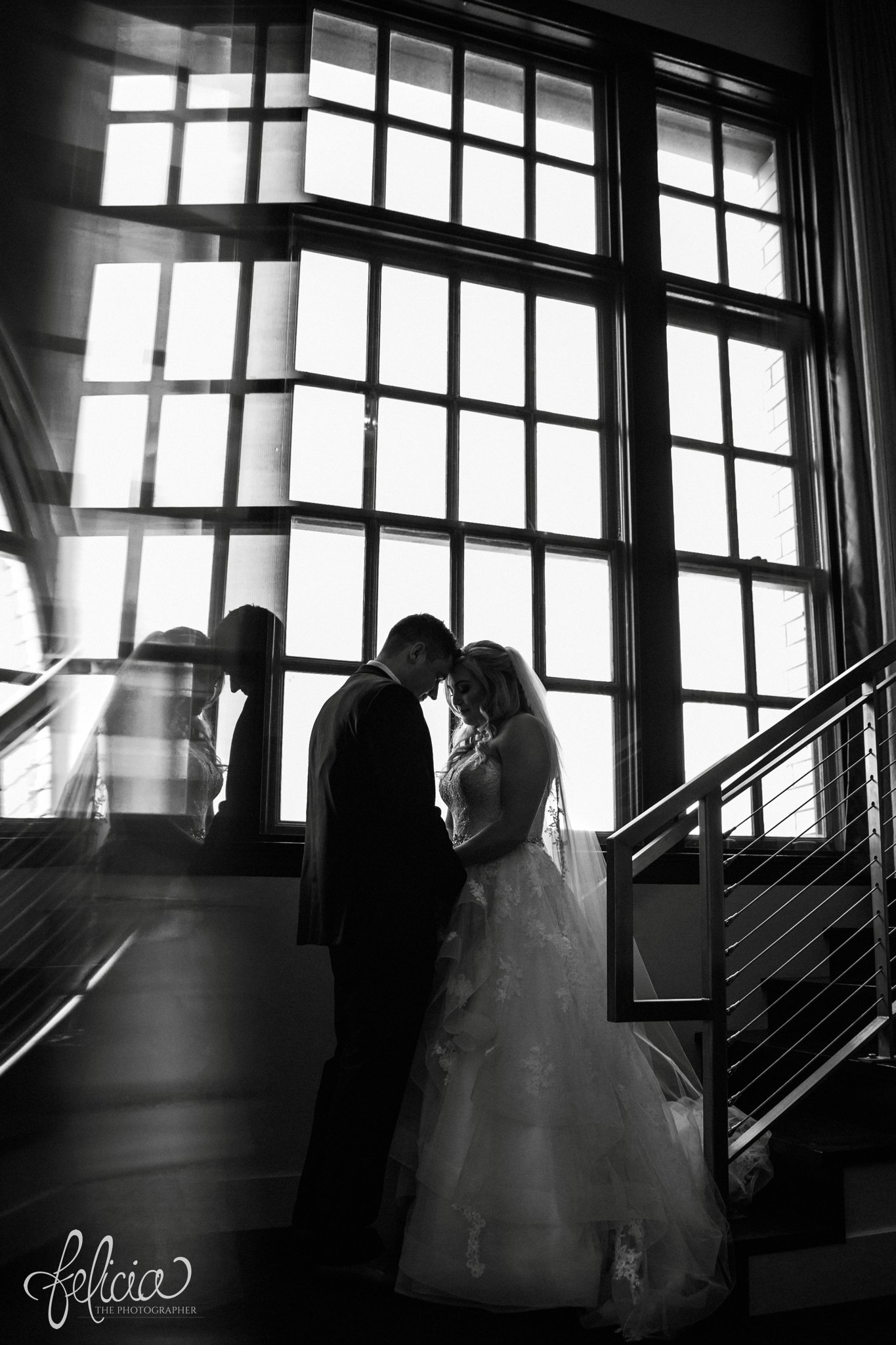 images by feliciathephotographer.com | wedding photographer | downtown kansas city | first look | hotel ambassador | natural lighting | romantic | belle vogue | mens warehouse | glamorous | intimate | black and white | reflection | abstract | artsy | 