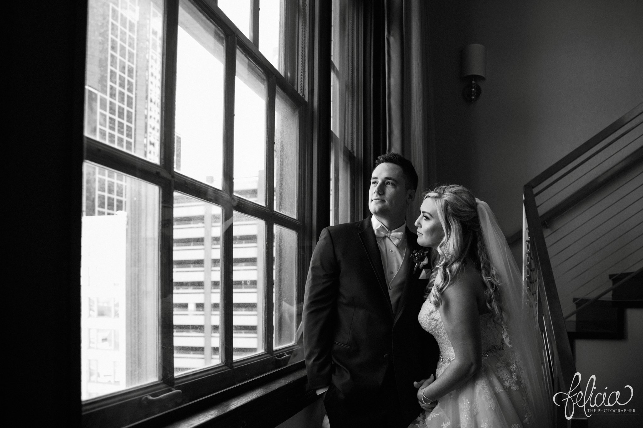 images by feliciathephotographer.com | wedding photographer | downtown kansas city | first look | hotel ambassador | natural lighting | romantic | belle vogue | mens warehouse | glamorous | intimate | black and white | 