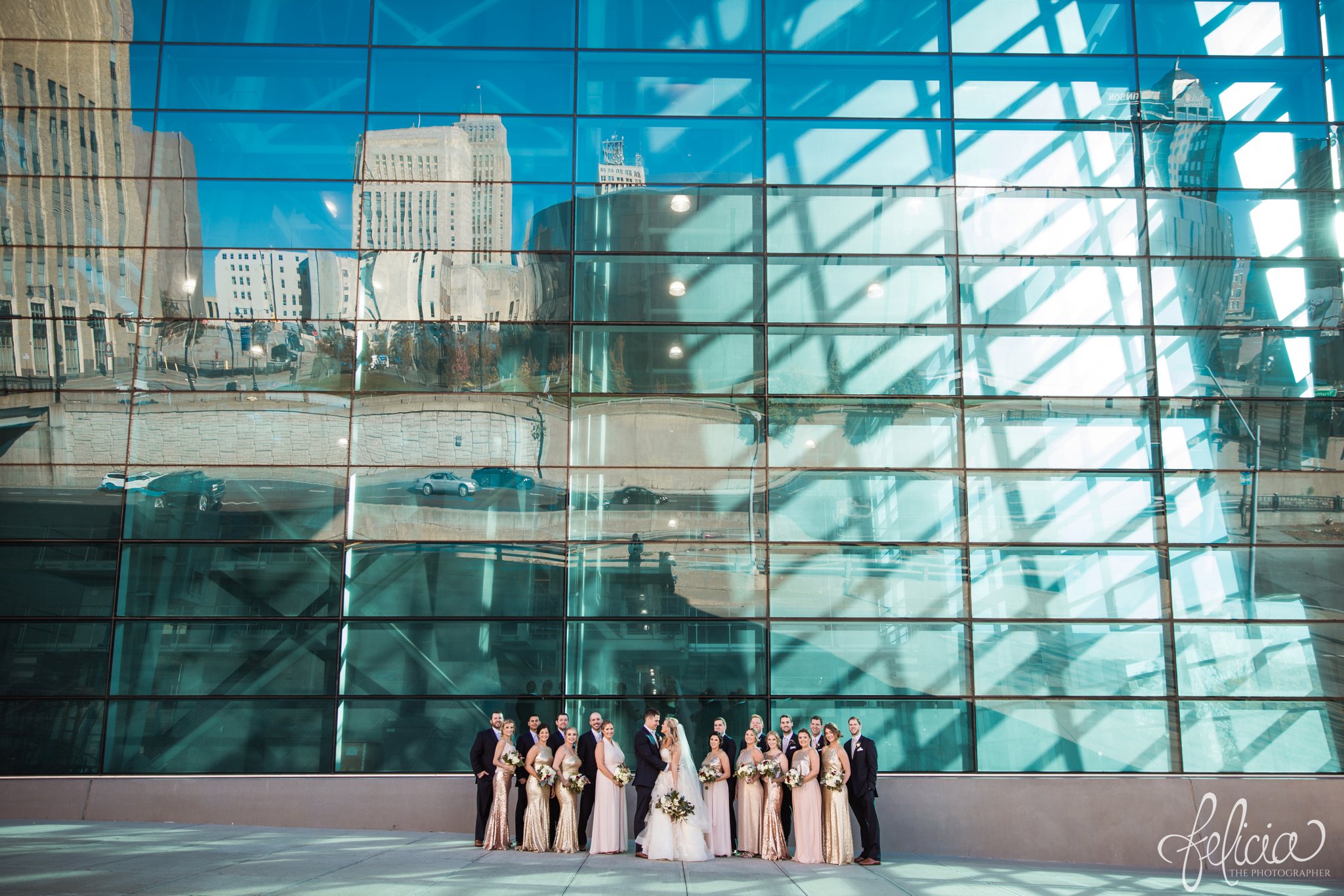images by feliciathephotographer.com | wedding photographer | downtown kansas city | bridal party portrait | Kauffman center |  light pink | gold | sequins | bella bridesmaids | belle vogue | 