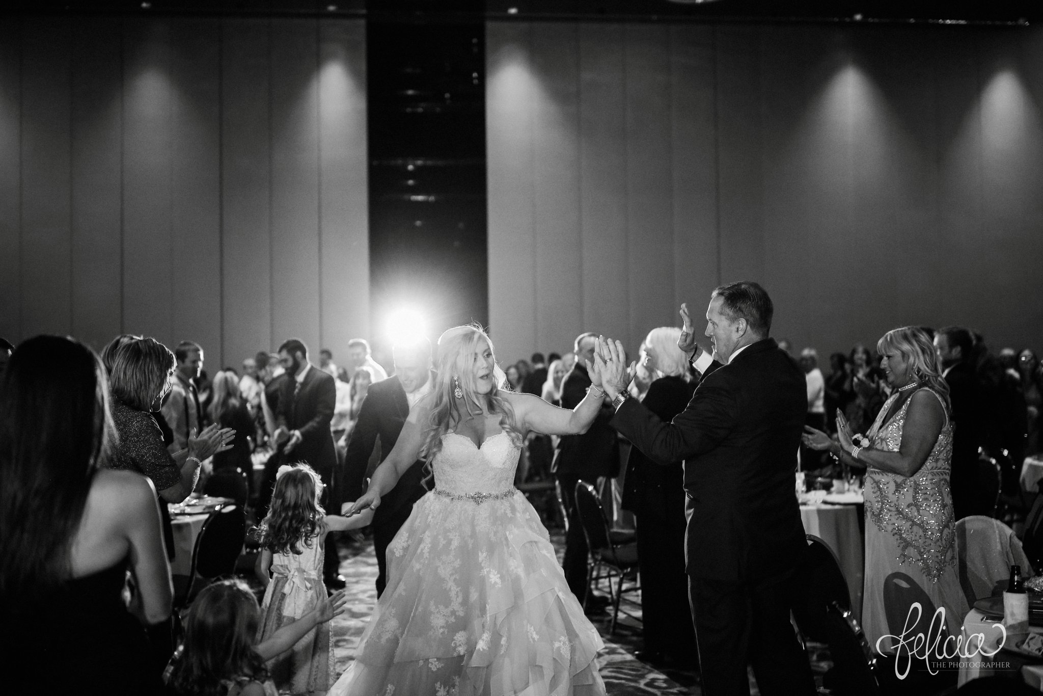 images by feliciathephotographer.com | wedding photographer | downtown kansas city | reception | grand entrance | high five | father daughter | black and white | 