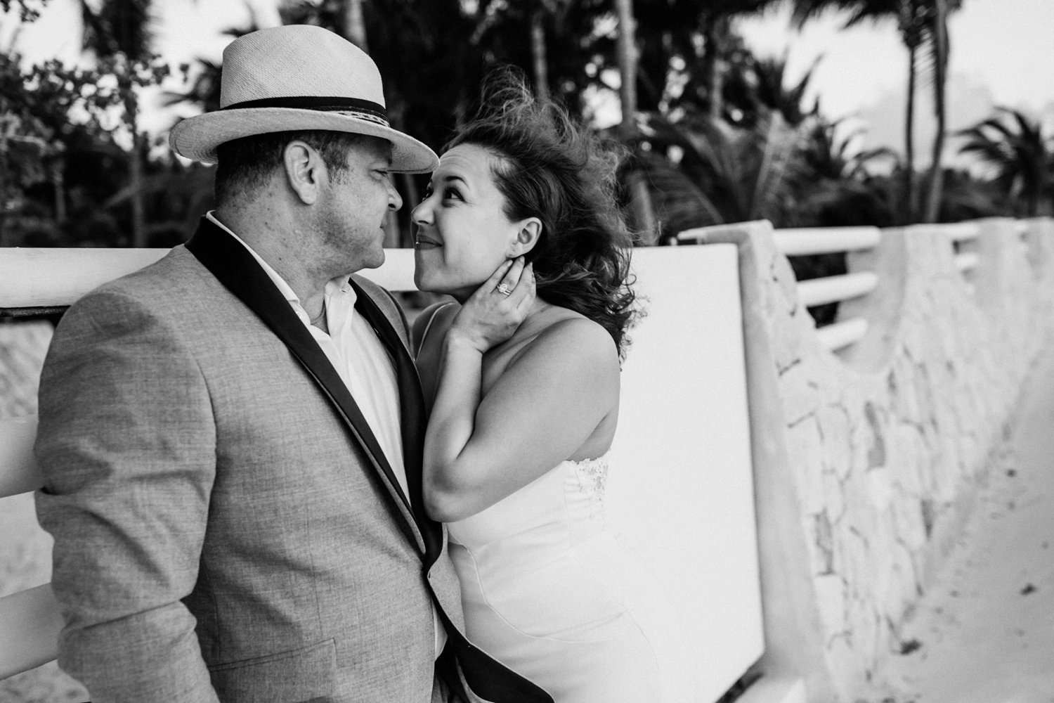  images by feliciathephotographer.com | destination wedding photographer | mexico | tropical | fiji | venue | azul beach resort | riviera maya | sunrise portraits | walking by the ocean | black and white | bride and groom | romantic | whimsical | long gown | grey suit | 