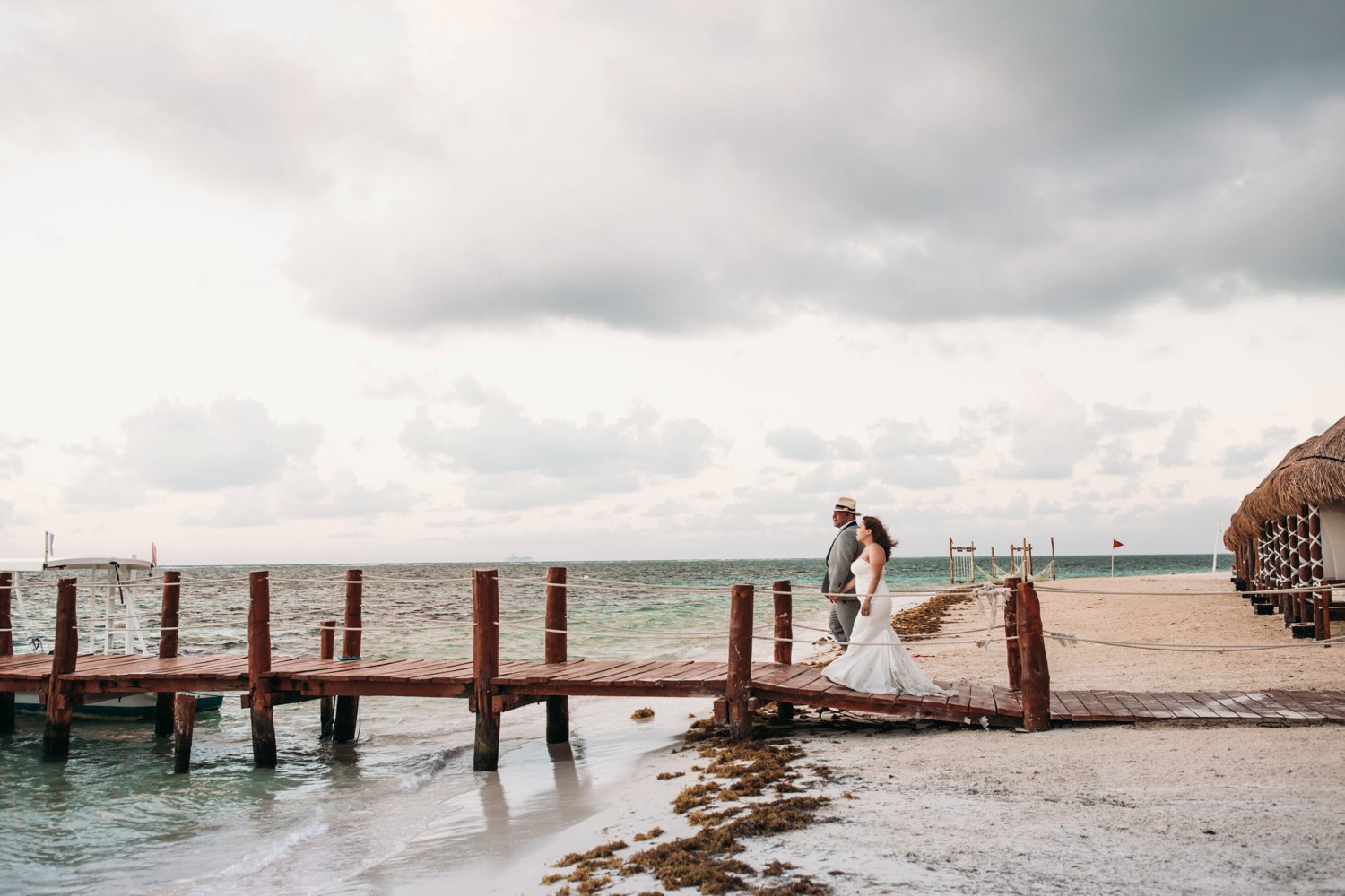  images by feliciathephotographer.com | destination wedding photographer | mexico | tropical | fiji | venue | azul beach resort | riviera maya | sunrise picture | bridal portraits | palm trees | romantic | barefoot | walking by the ocean | 