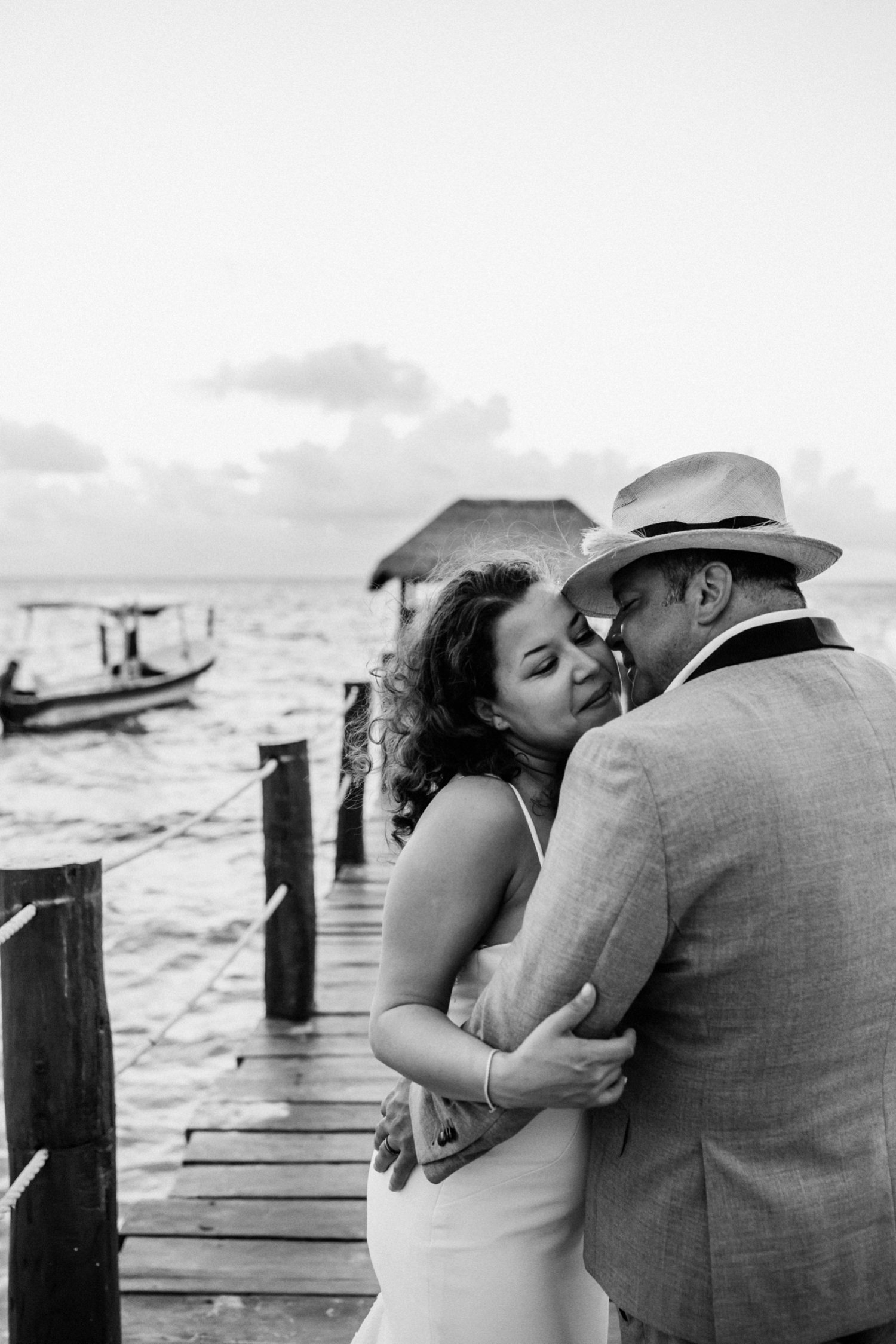  images by feliciathephotographer.com | destination wedding photographer | mexico | tropical | fiji | venue | azul beach resort | riviera maya | black and white | sunrise | bridal portraits | lace dress | grey suit | marina | oceanside | 