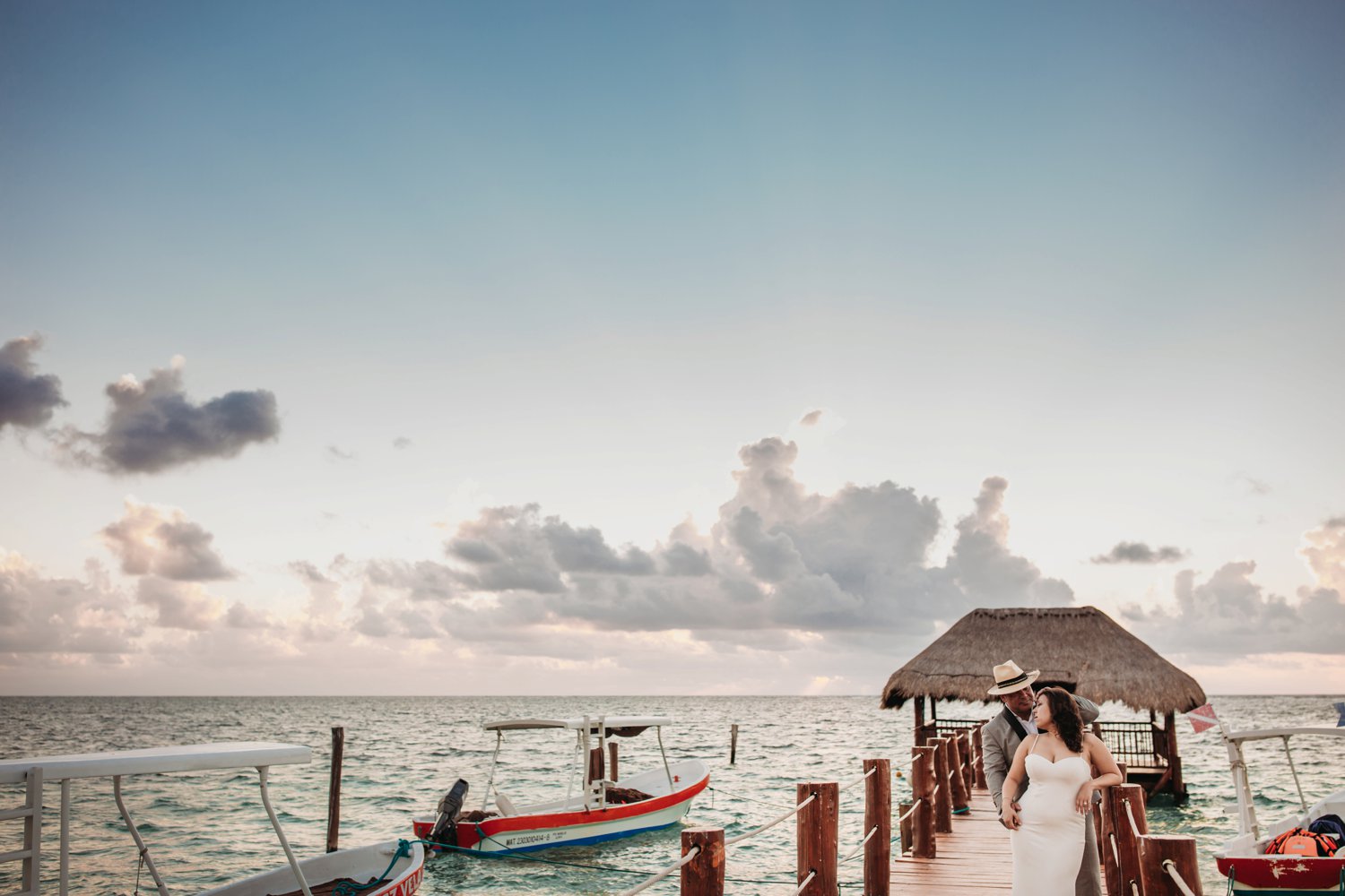  images by feliciathephotographer.com | destination wedding photographer | mexico | tropical | fiji | venue | azul beach resort | riviera maya | bridal portraits | lace dress | grey suit | sunrise | oceanside | romantic | whimsical | cotton candy skies | catamaran | dock cabana | 