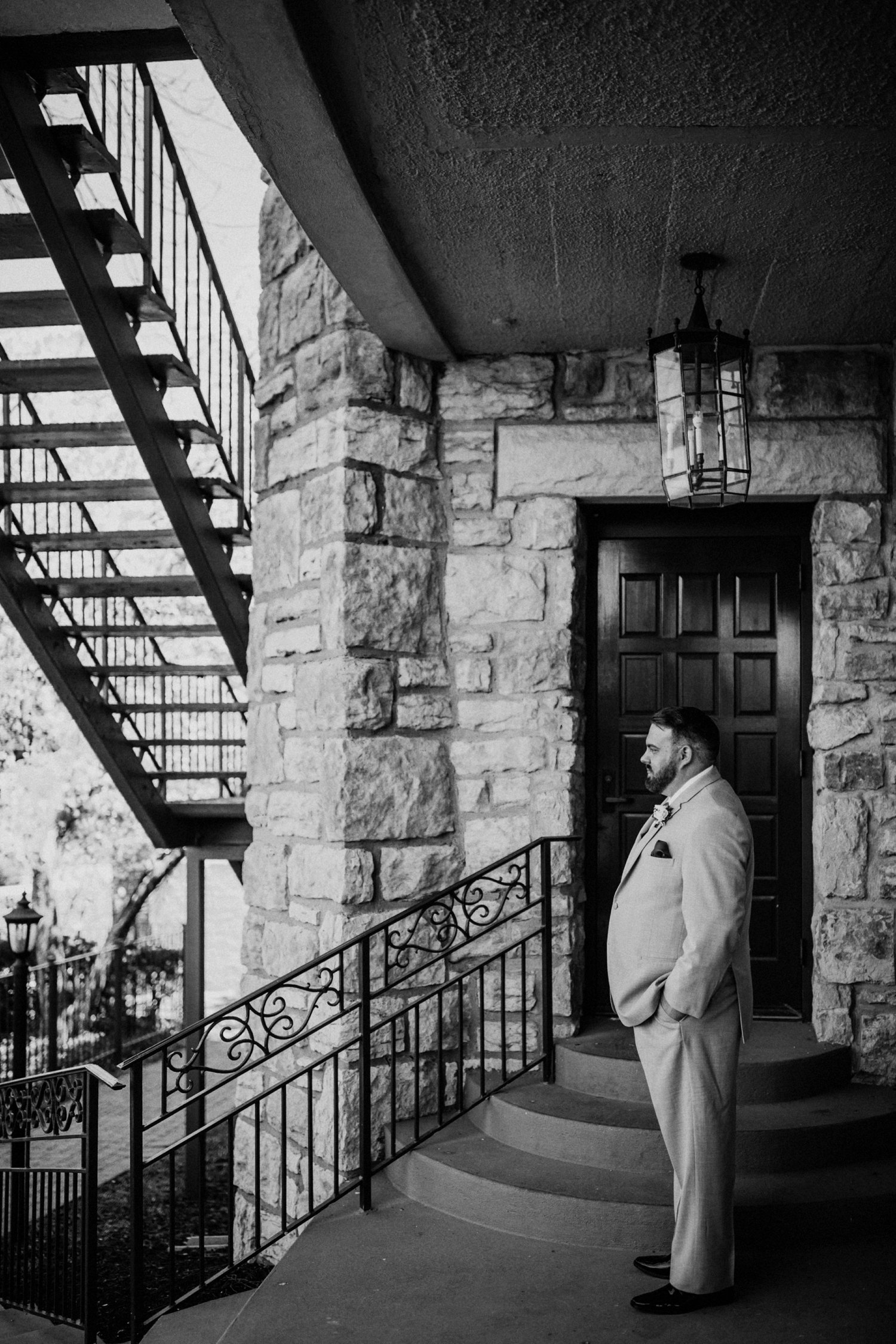  images by feliciathephotographer.com | destination wedding photographer | spring time | carriage club | exclusive | groom | details | getting ready | black and white | jos a bank | stone background | iron staircase | kansas city | 