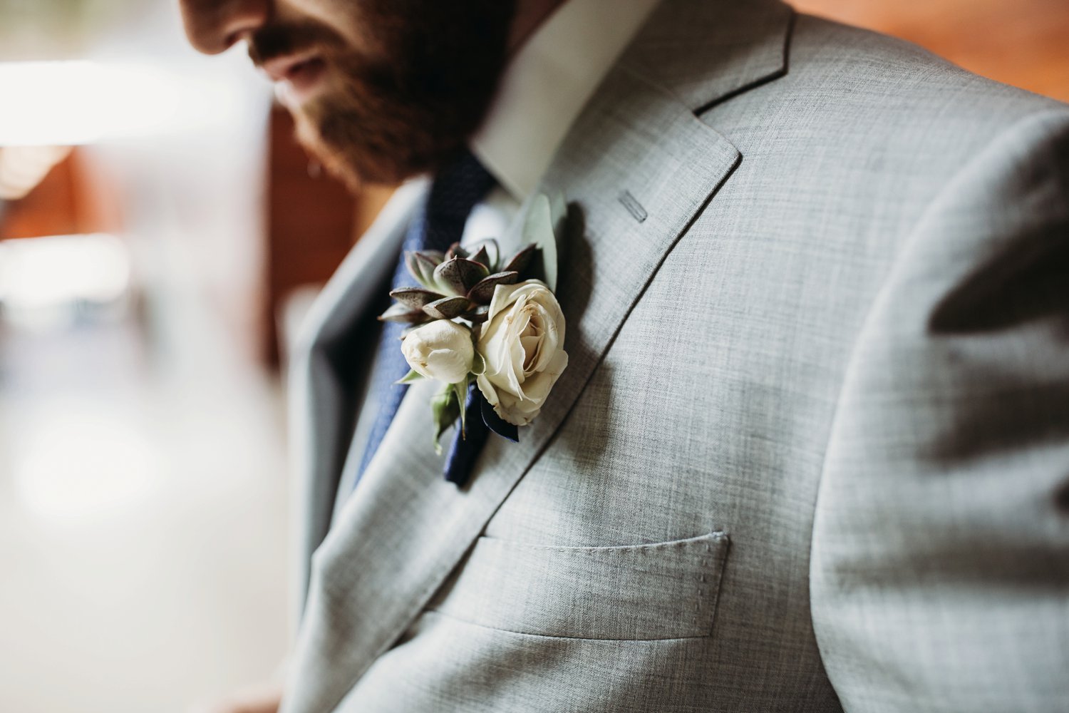  images by feliciathephotographer.com | destination wedding photographer | kansas city | spring time | getting ready | details | grey suit | blue tie | boutonniere | the black tux | 