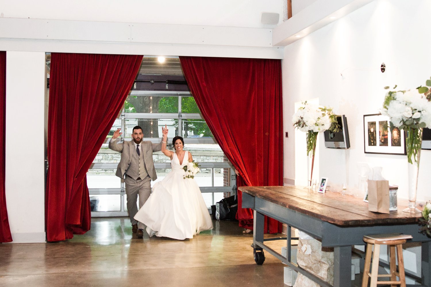 images by feliciathephotographer.com | destination wedding photographer | kansas city | spring time | reception | grand entrance | vox theatre | red curtains | a line gown | grey suit | davids bridal | the black tux | 