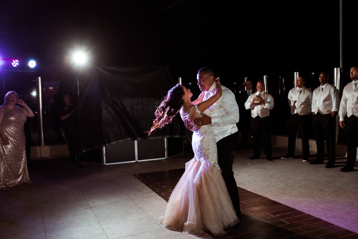  images by feliciathephotographer.com | destination wedding photographer | el dorado riviera maya | glamorous | beachside | resort | first dance | reception | choreographed argentine tango | contrast | party | celebration | allure | the black tux | beaded backed gown | 