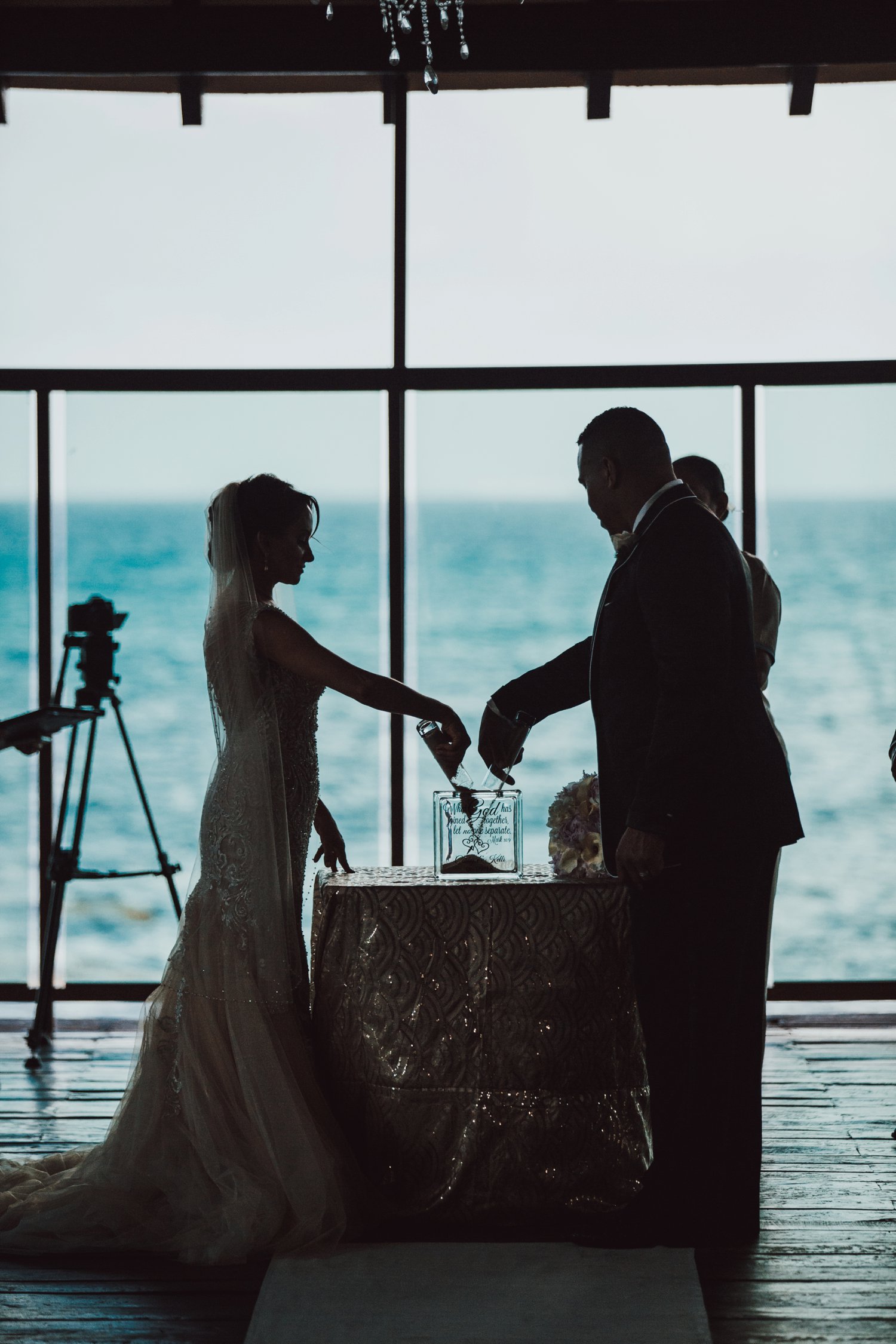  images by feliciathephotographer.com | destination wedding photographer | el dorado riviera maya | glamorous | beachside | resort | ceremony | unity sand | blue waters | oceanside | contrast | silhouette | 