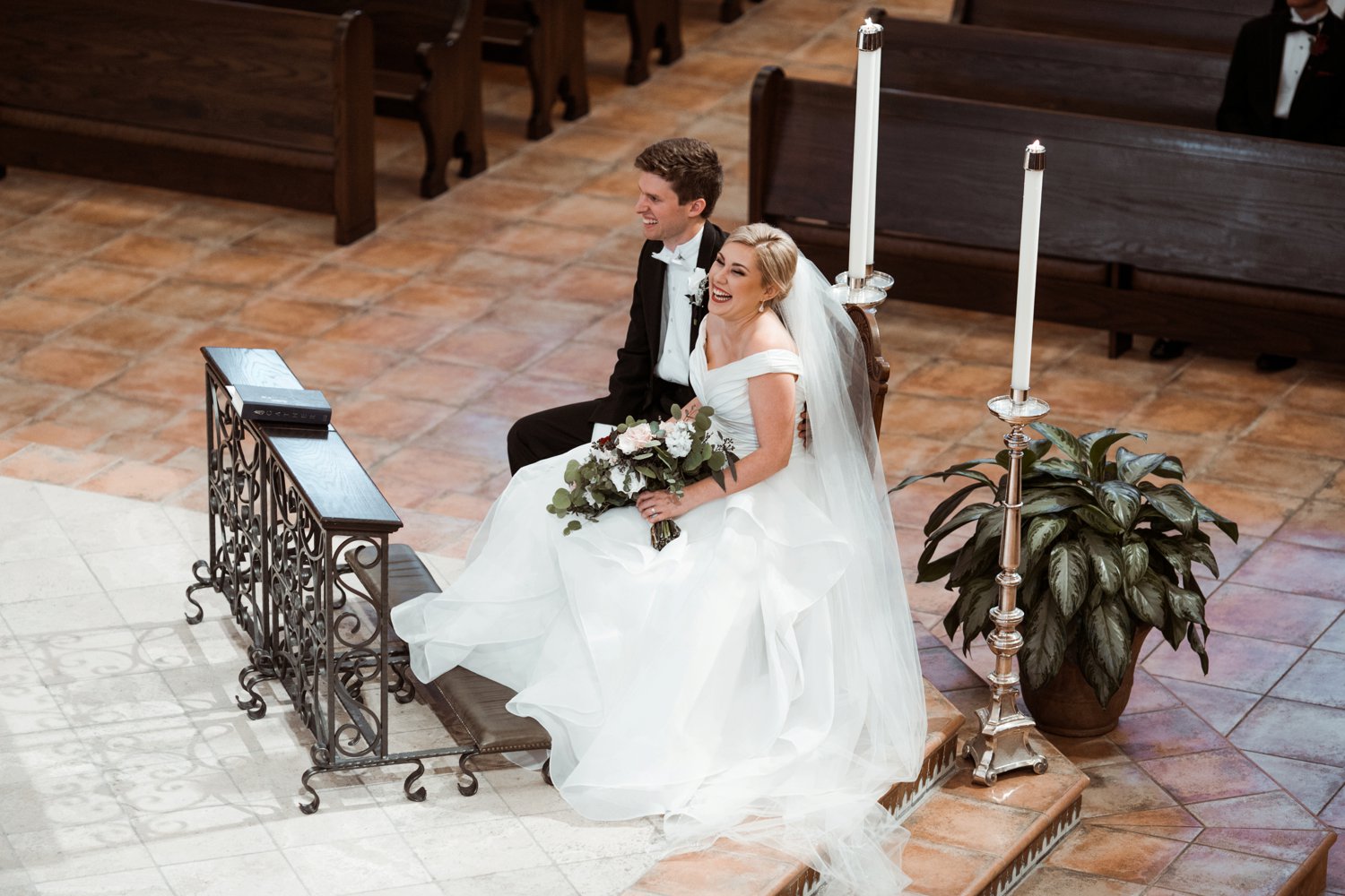  images by feliciathephotographer.com | destination wedding photographer | kansas city | summertime | classic | ceremony | visitation church | catholic | laughter | bride and groom | 