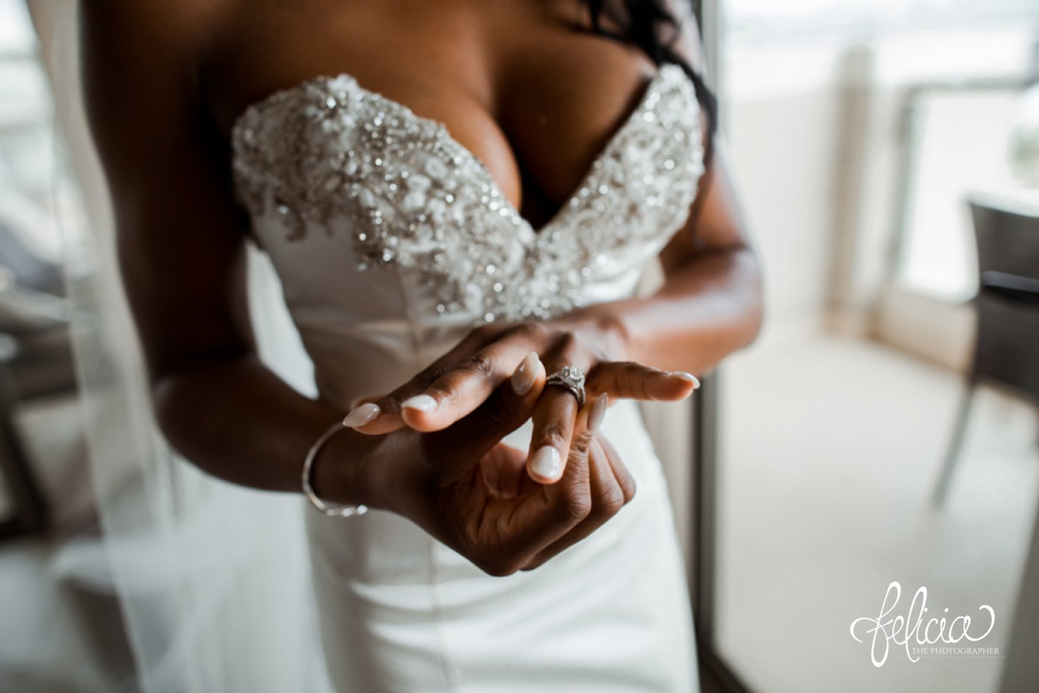   images by feliciathephotographer.com | destination wedding photographer | st lucia | l&s travel | the Royalton | getting ready | putting on the dress | details | beaded bodice | kleinfeld | satin | diamond engagement ring | nude nails | strapless | 