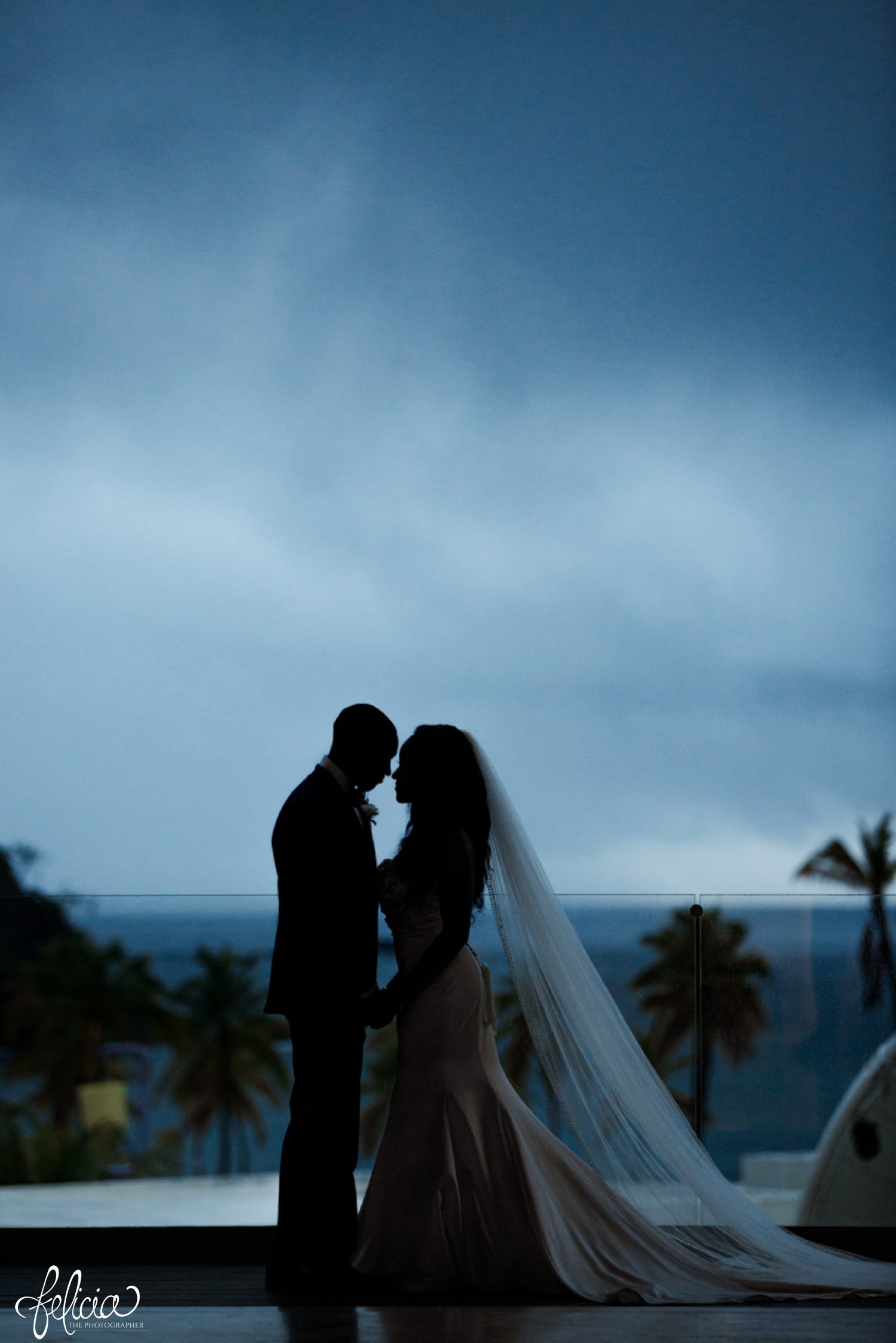   images by feliciathephotographer.com | destination wedding photographer | st lucia | l&s travel | the Royalton | couple portraits | bride and groom | night on the beach | thunder storm | fire lighting | romantic | white gown | kleinfeld | navy suit | 