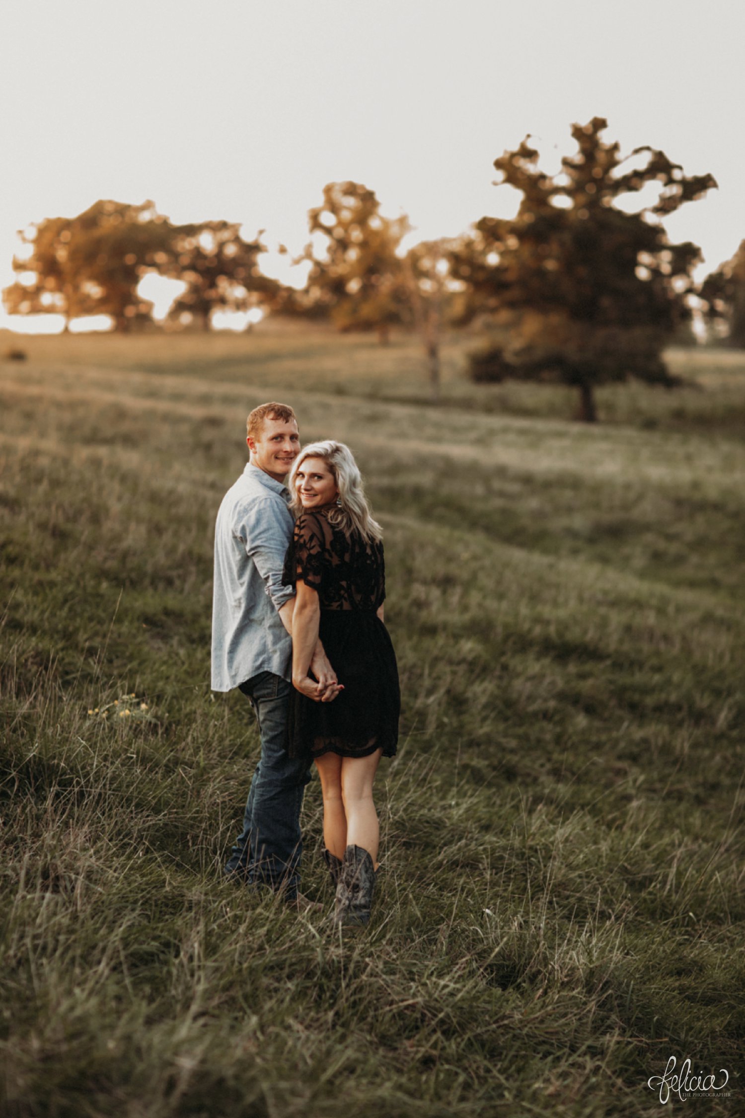 images by feliciathephotographer.com | destination wedding photographer | engagement | farmhouse | country | kansas city | sweet southern | black eyelet romper | unique halo diamond ring | casual | black boots | amazon | cowboy | red nails | nature | holding hands | golden hour | 