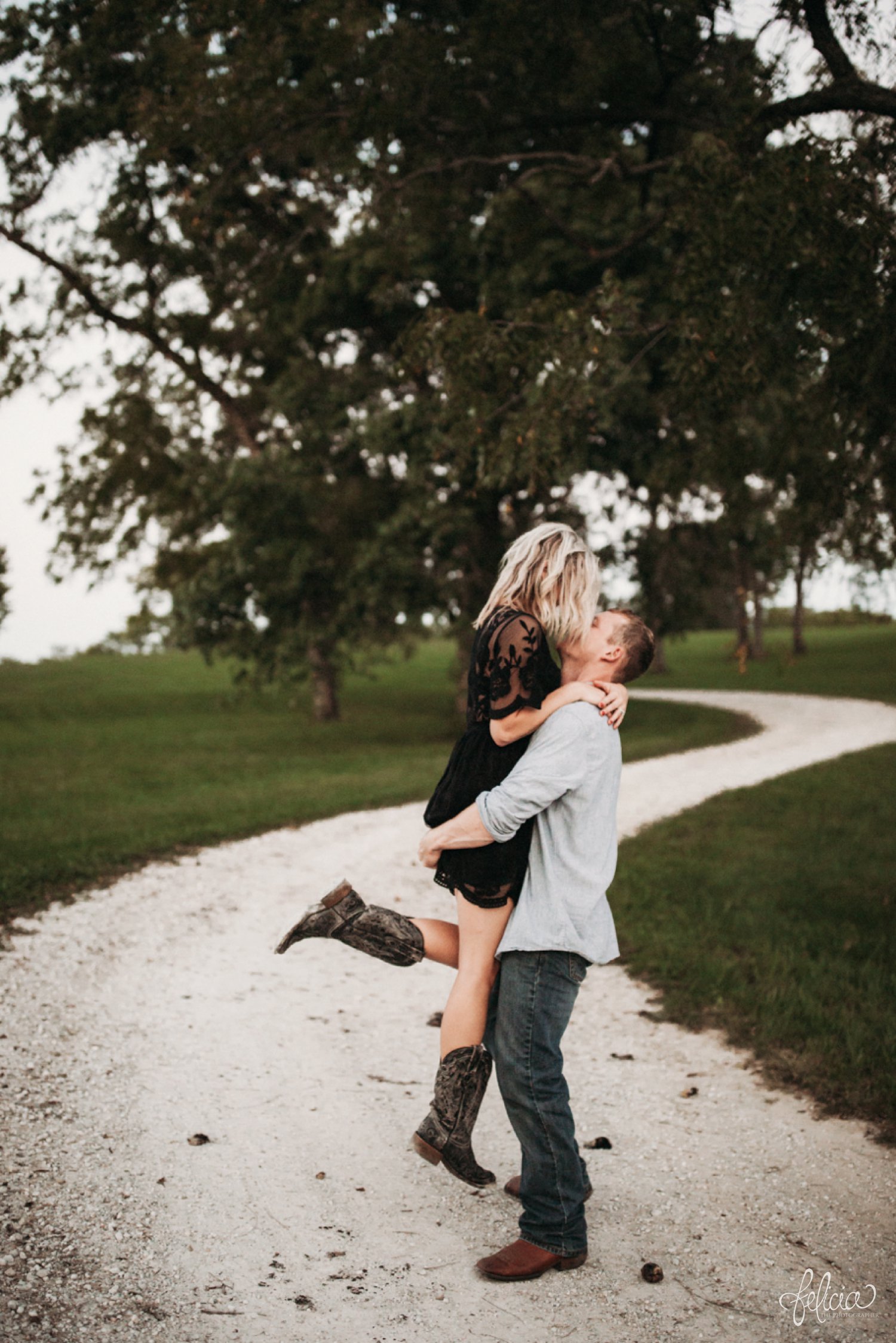 images by feliciathephotographer.com | destination wedding photographer | engagement | farmhouse | country | kansas city | sweet southern | black eyelet romper | unique halo diamond ring | casual | black boots | amazon | cowboy | red nails | nature | black and white | gravel road | 