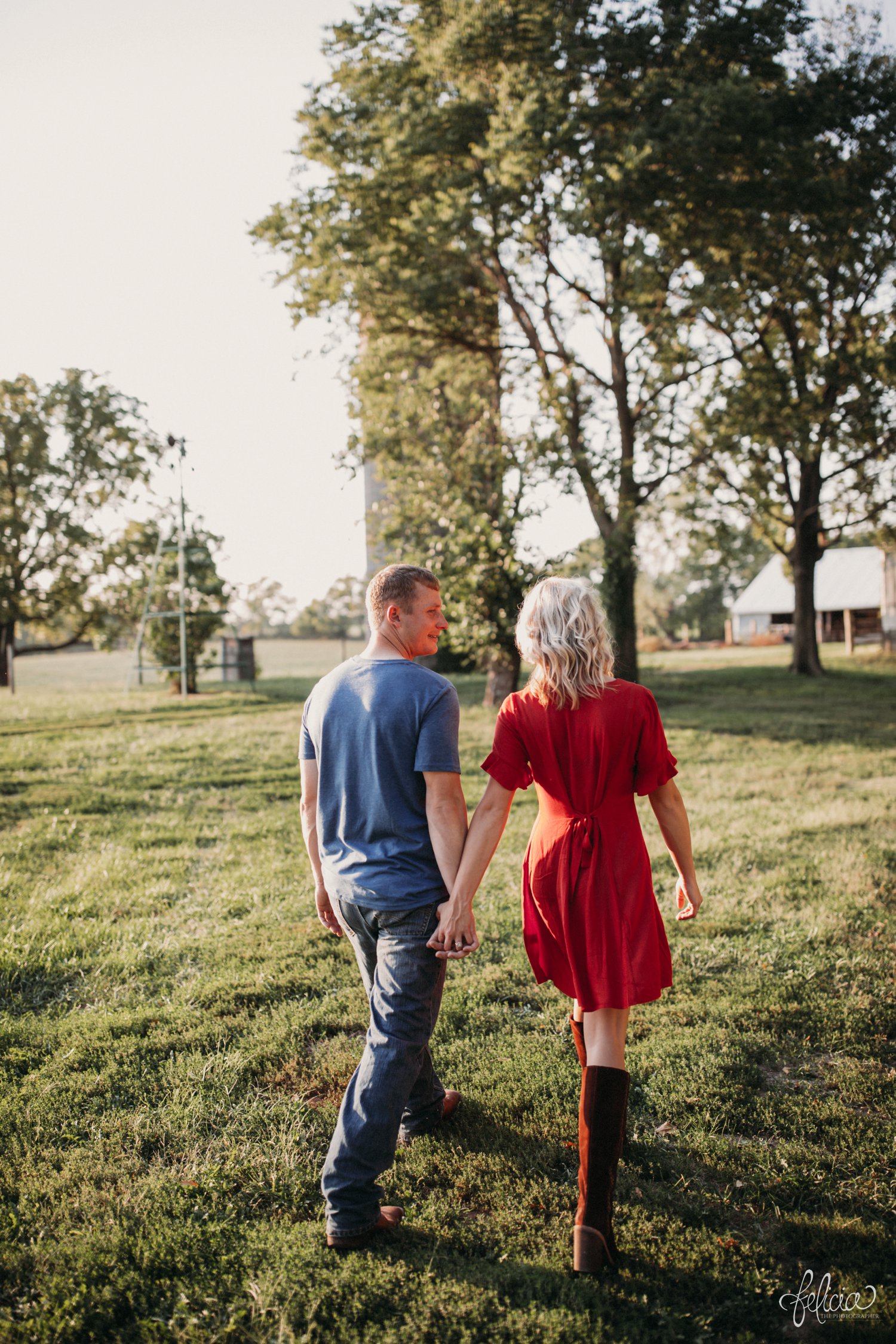images by feliciathephotographer.com | destination wedding photographer | engagement | farmhouse | country | kansas city | sweet southern | red dress | nordstrom rack | unique halo diamond ring | casual | brown boots | amazon | cowboy | hand in hand | 