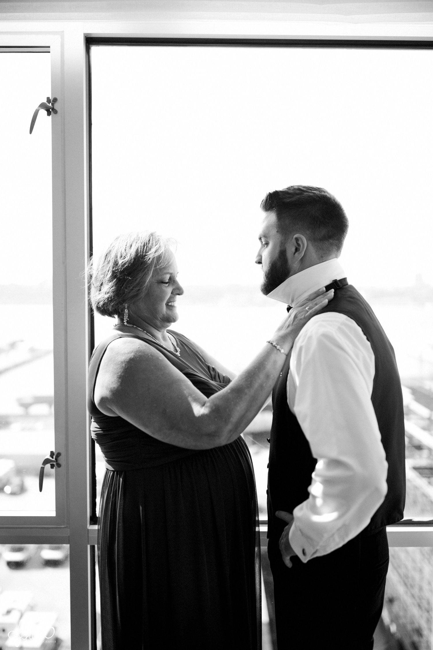 images by feliciathephotographer.com | destination wedding photographer | new york city | details | pre ceremony | getting ready | kimpton ink48 hotel | mother of the groom | suit | city view | natural light | black and white | mens warehouse | 