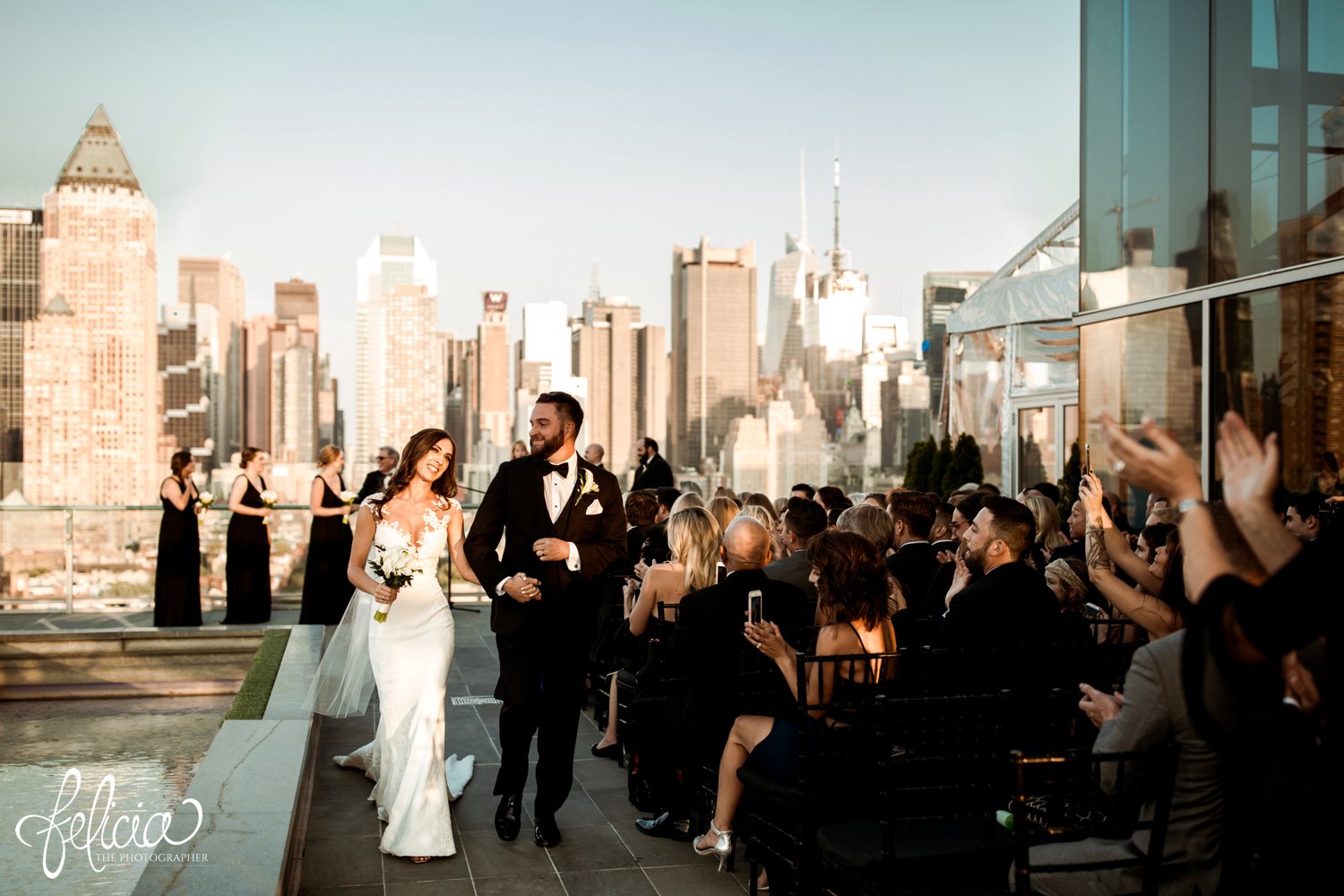 images by feliciathephotographer.com | destination wedding photographer | new york city | ceremony | rooftop | skyline | urban | romantic | classic | emotional | bride and groom | long white gown | lace details | open back | black tuxedo | mens warehouse | pronovais | nordstrom | walking back down the aisle | mr and mrs | 